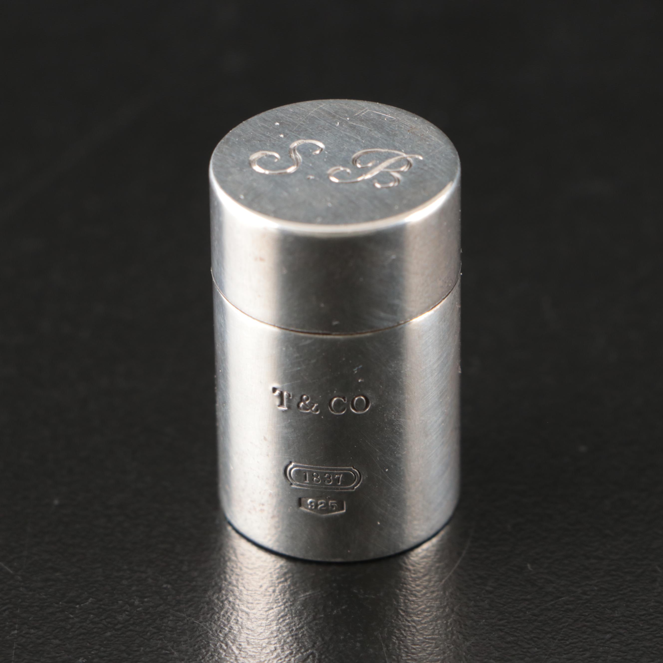 Tiffany & Co. Sterling Pill Case, Dunhill Sylphide Lighter and MOP Letter Opener