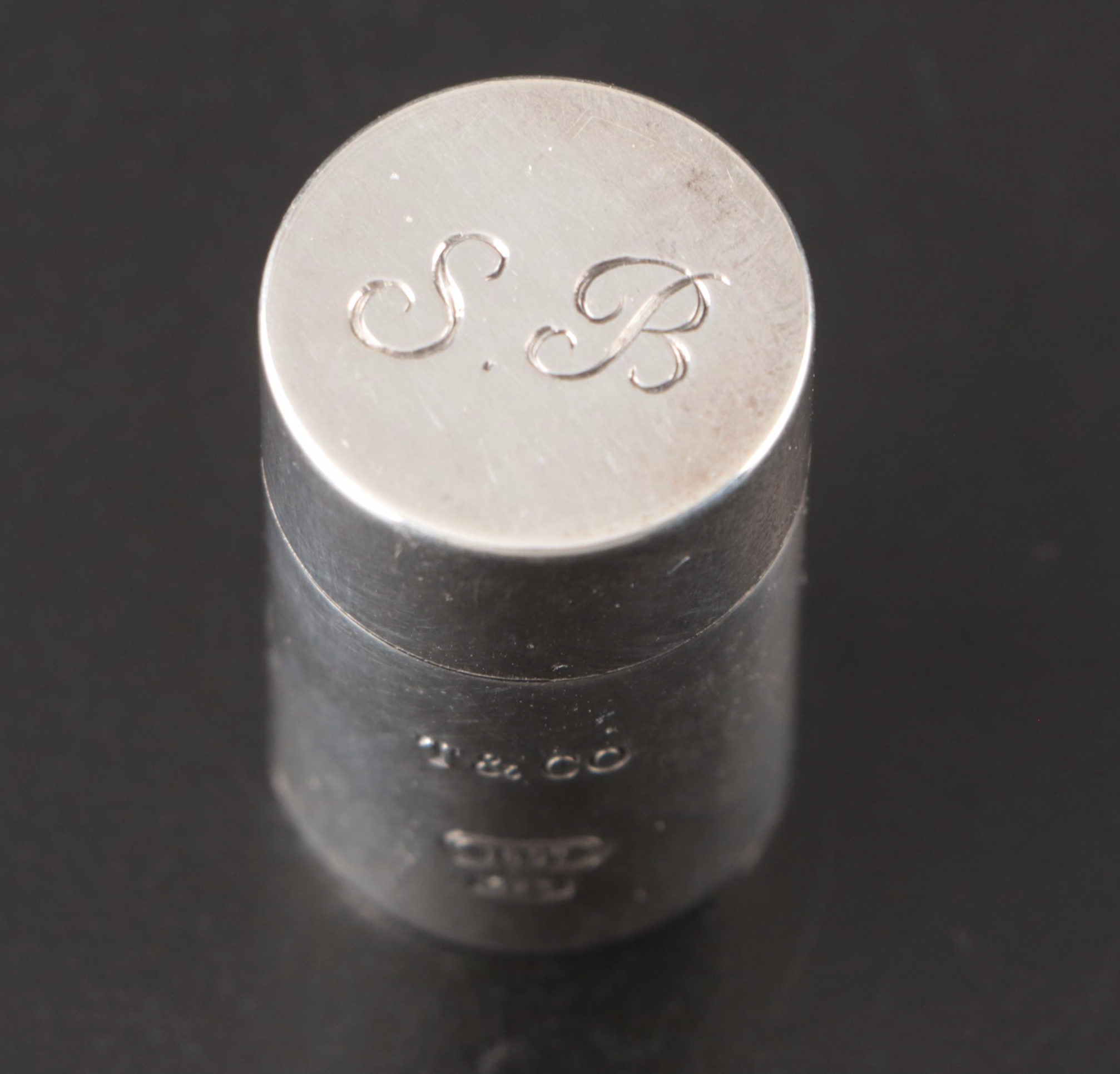 Tiffany & Co. Sterling Pill Case, Dunhill Sylphide Lighter and MOP Letter Opener