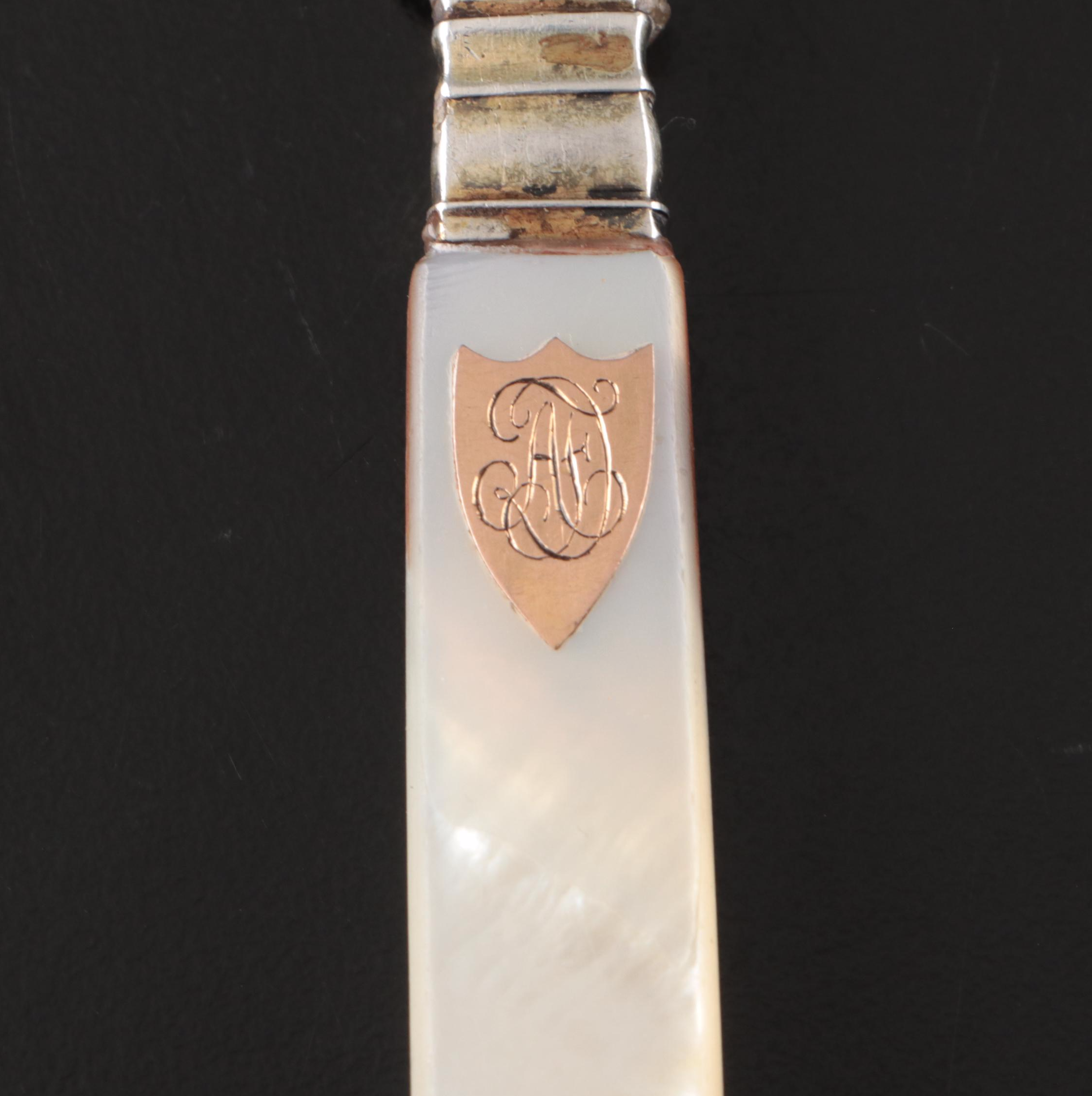 Tiffany & Co. Sterling Pill Case, Dunhill Sylphide Lighter and MOP Letter Opener