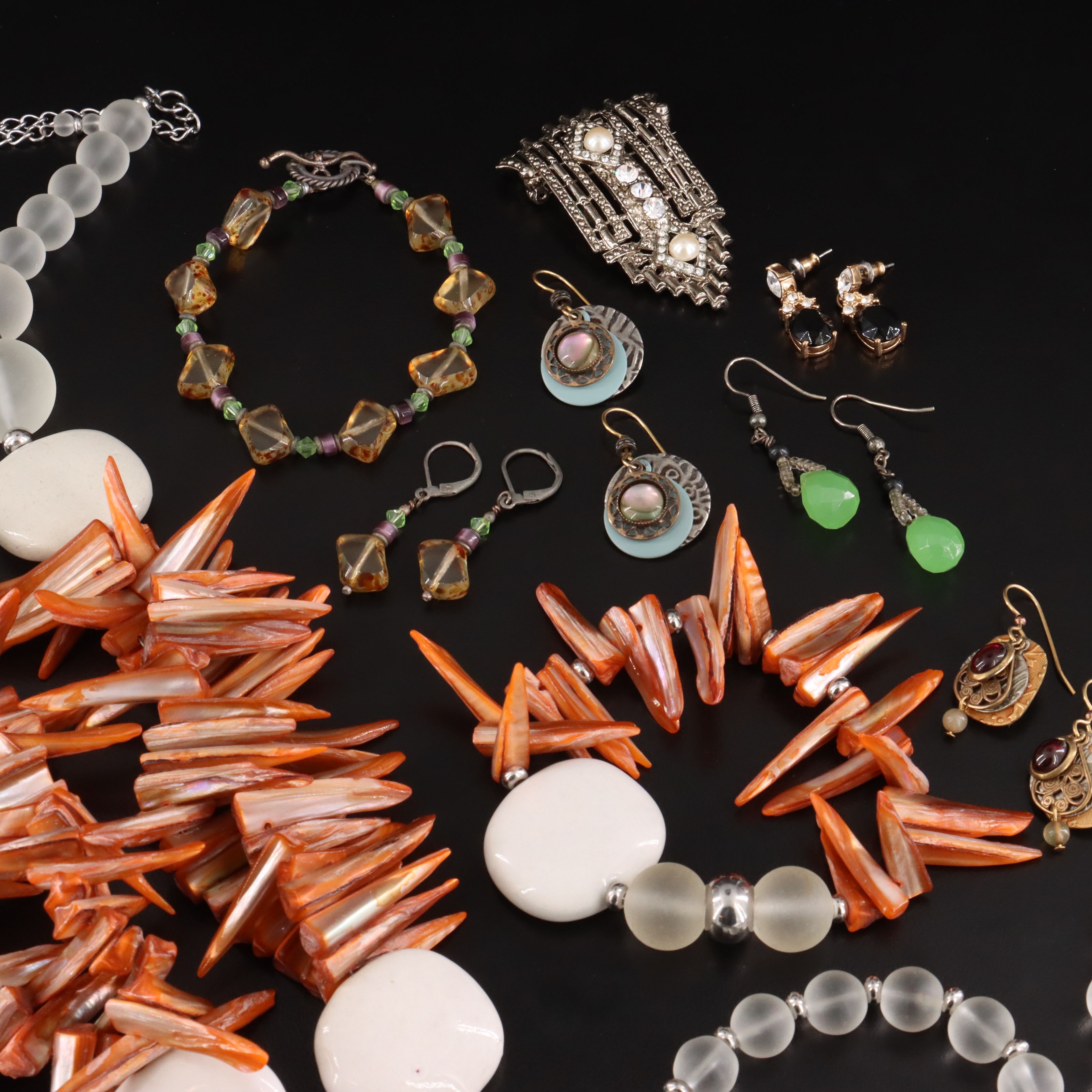 Jewelry Collection Featuring Red Line Designs, Shell and Abalone Doublet
