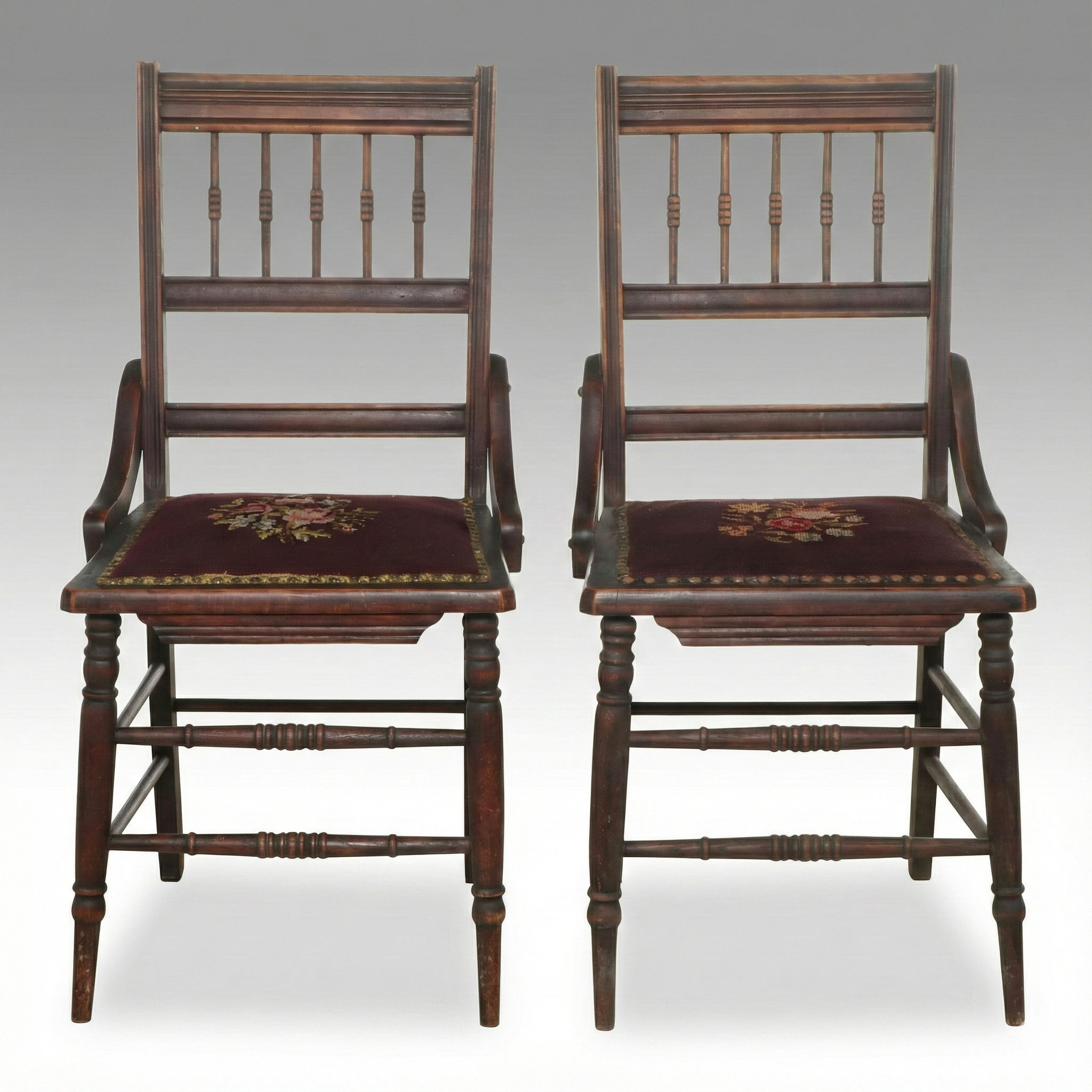 Pair of Eastlake Style Walnut Finish Chairs with Needlepoint Seats