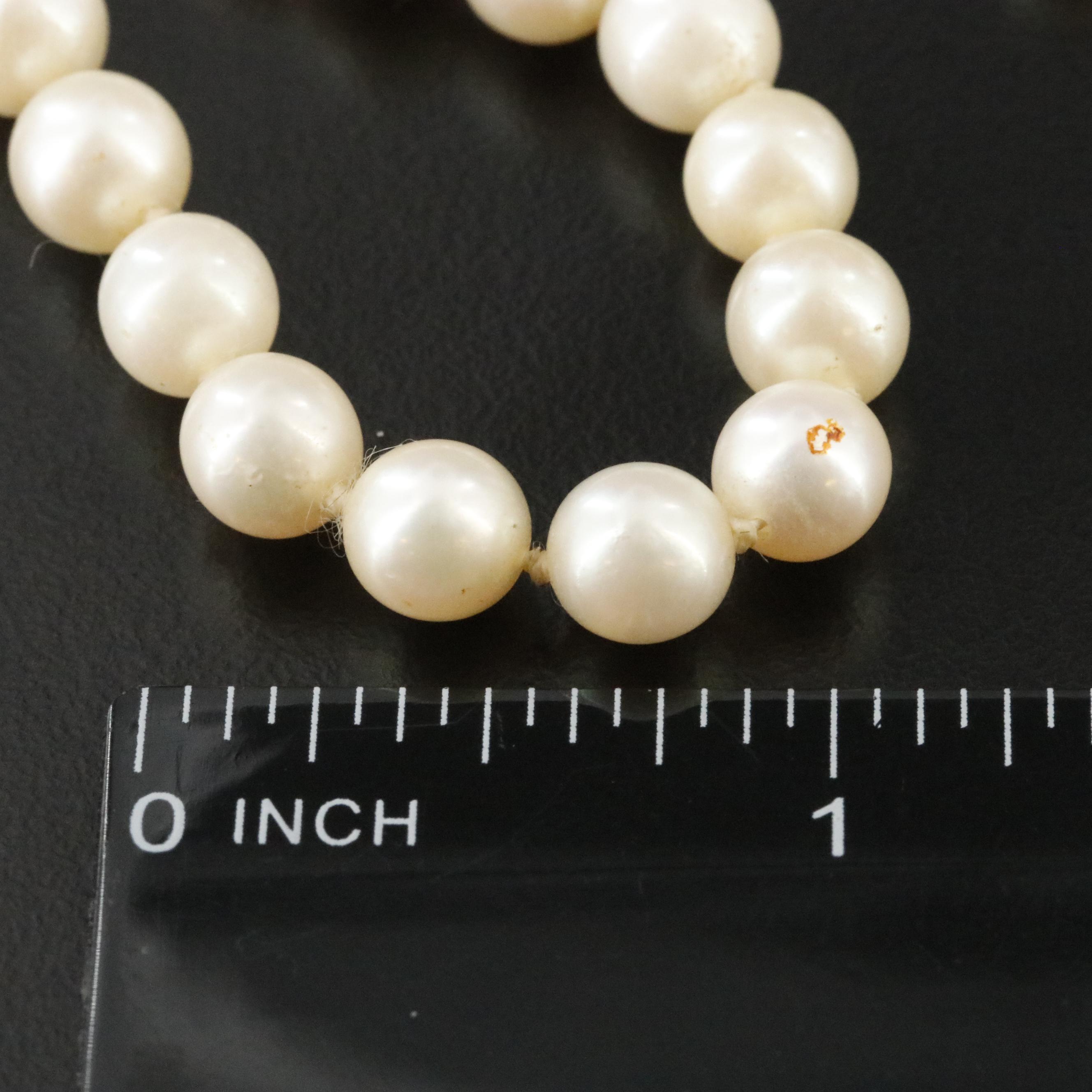 Pearl Necklace with 14K Flower Clasp