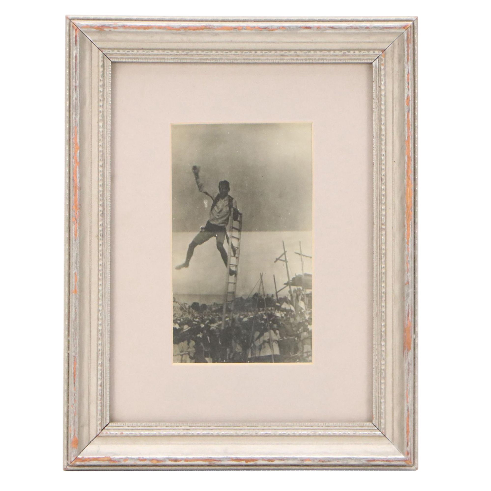 Silver Print of Figure Balancing on Ladder, Circa 1900
