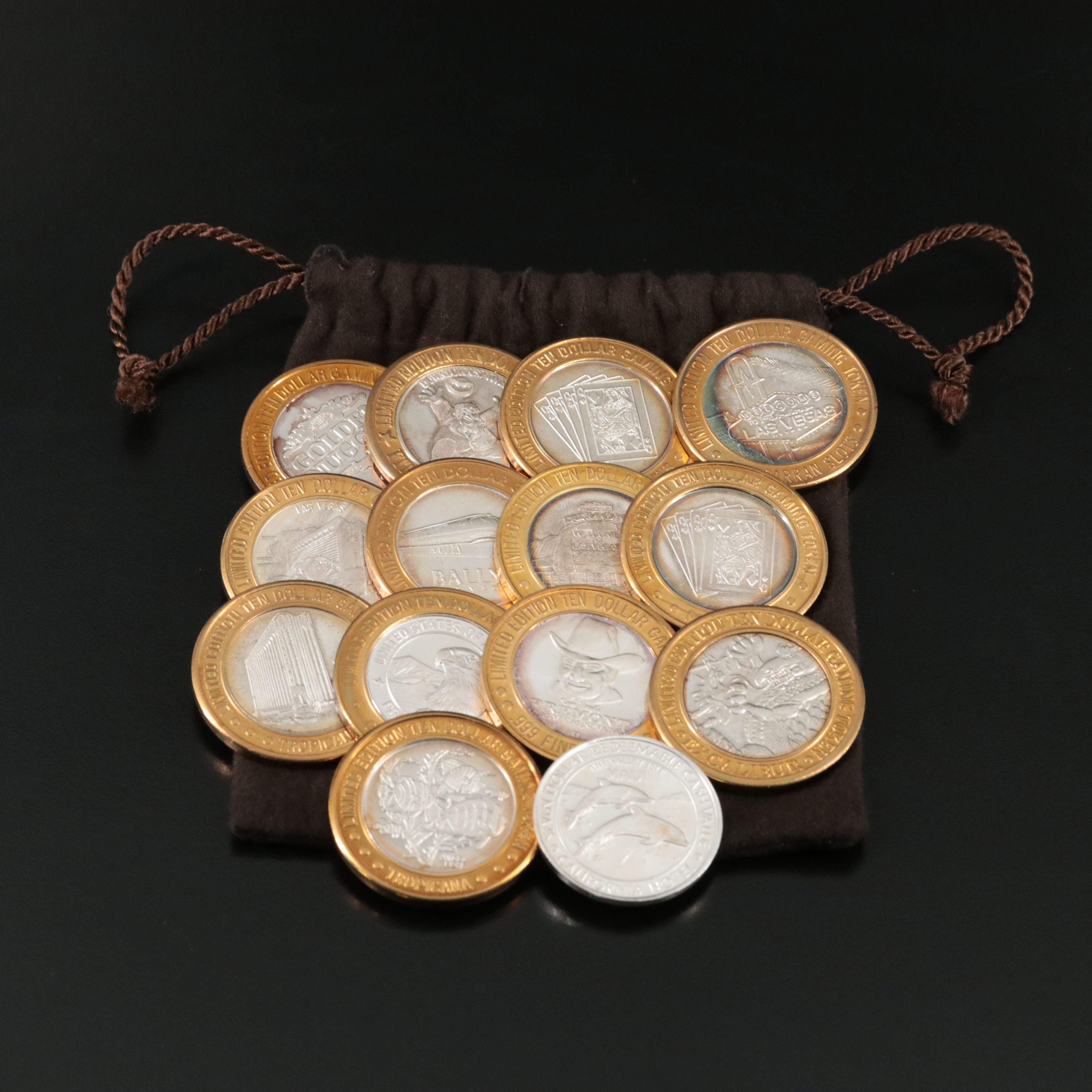 Thirteen Fine Silver Casino $10 Gaming Tokens, & One Fine Silver $7 Gaming Token