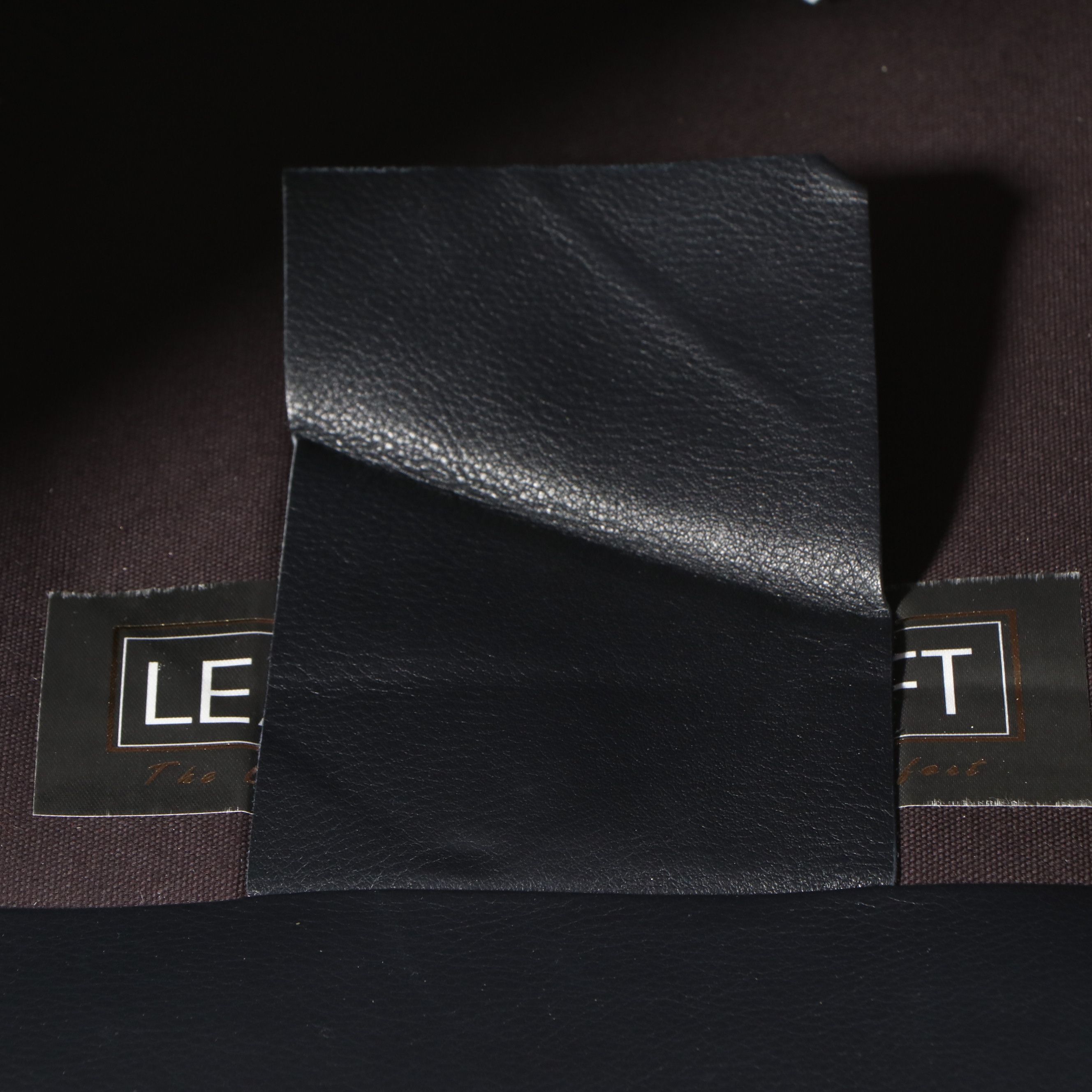 Leathercraft Quilted Leather Upholstered Recliner with Nailhead Trim