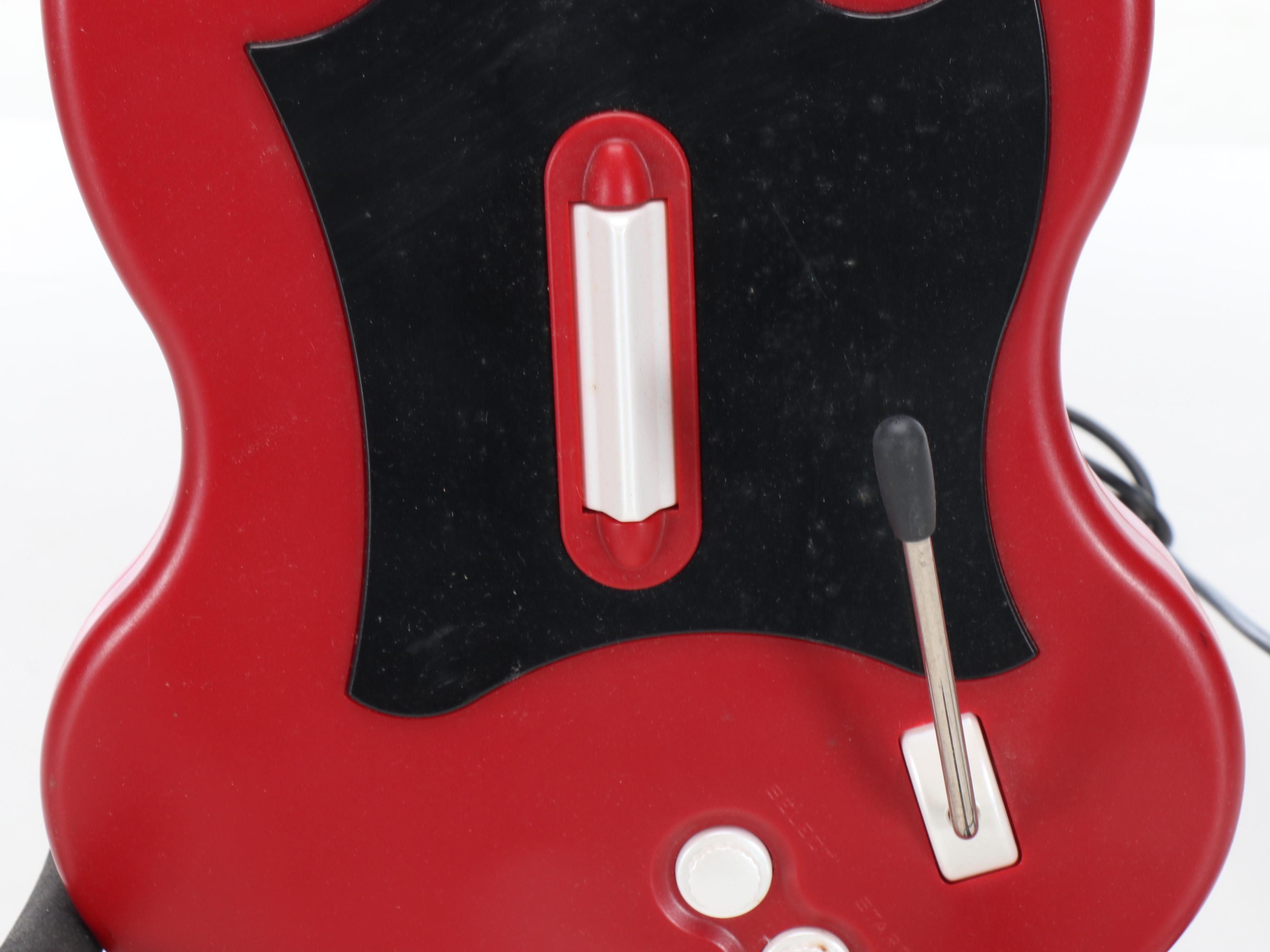 Sony Playstation 2 with Controllers, Guitars, Games and More Accessories