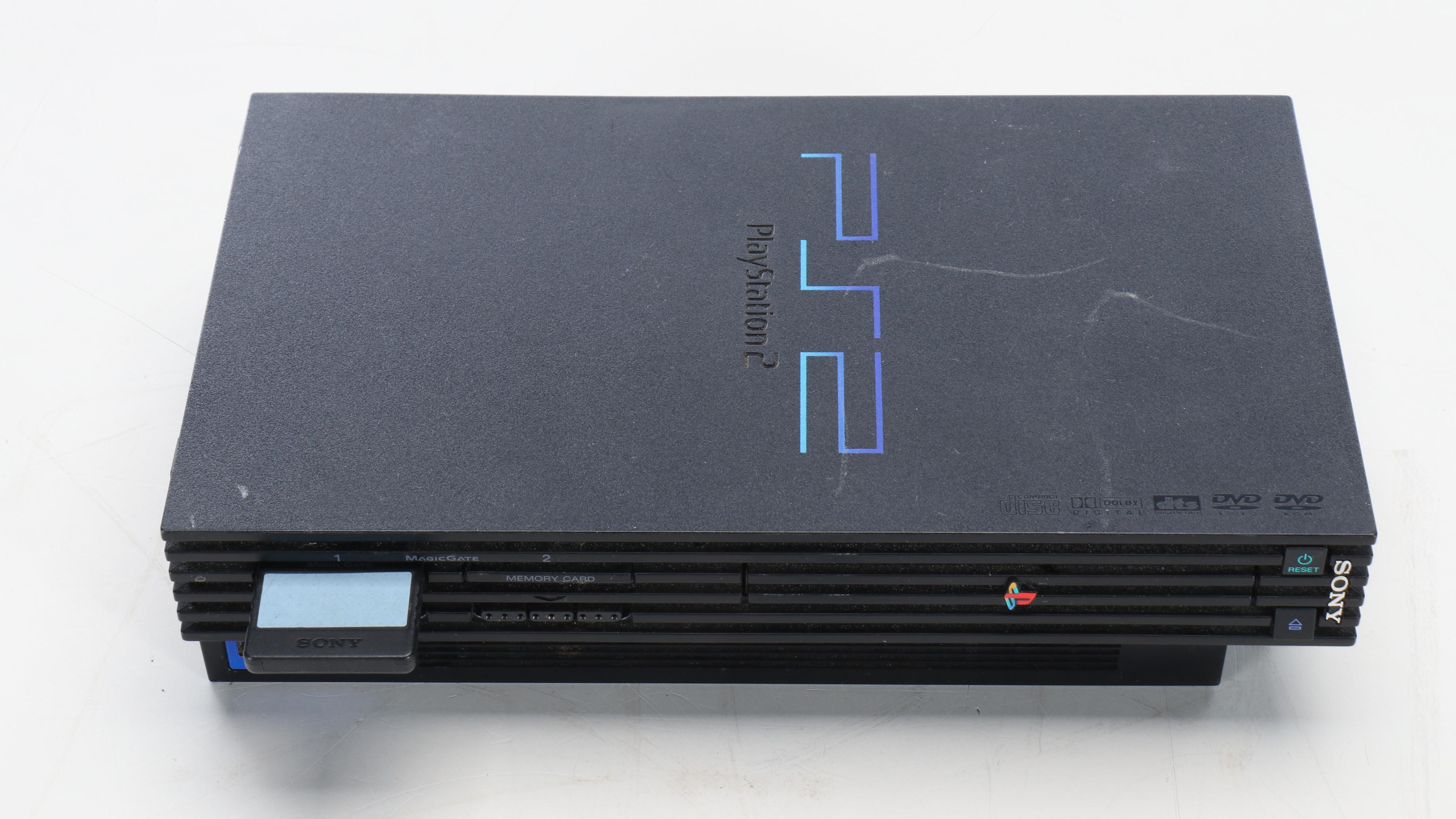 Sony Playstation 2 with Controllers, Guitars, Games and More Accessories