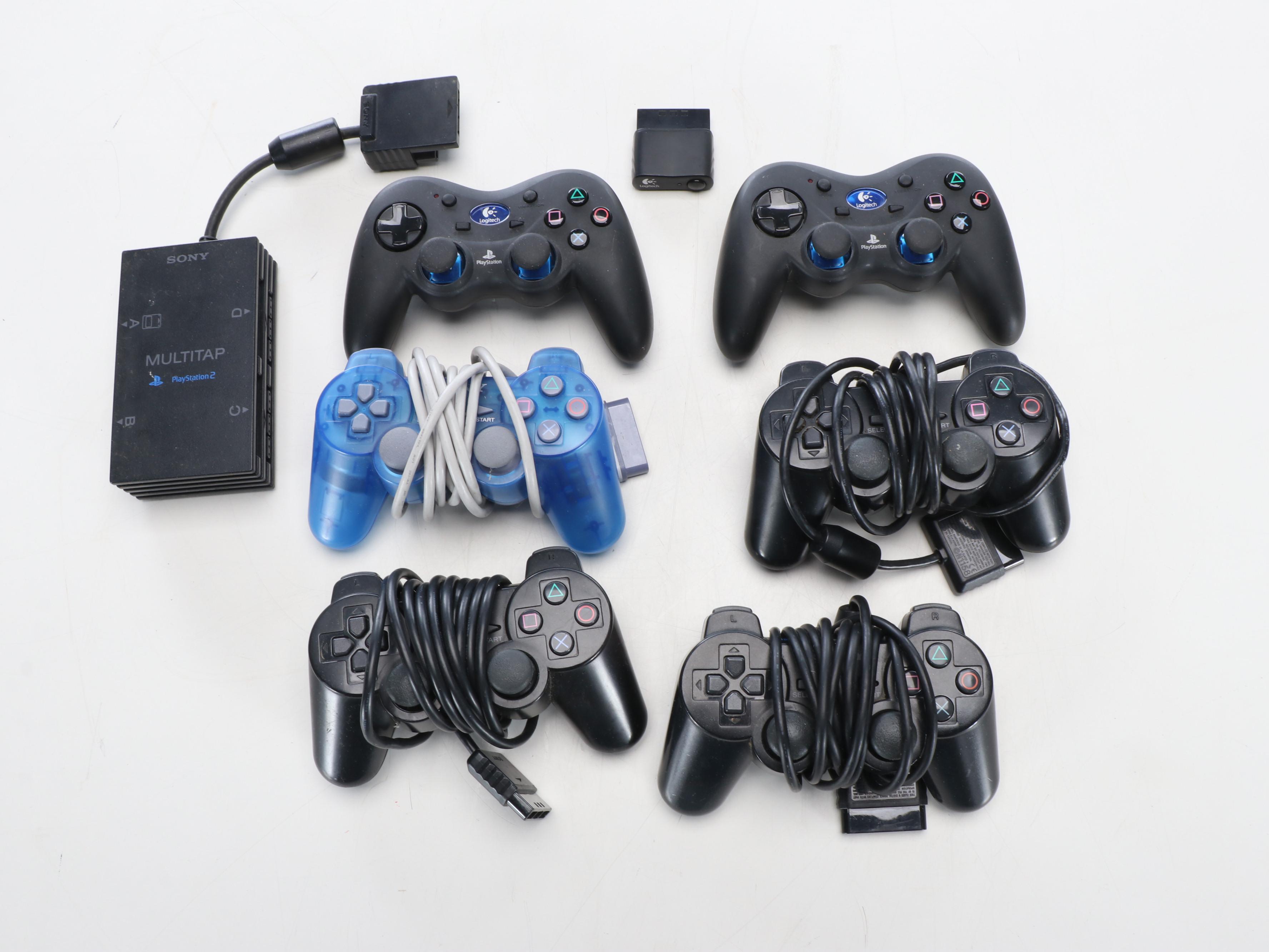 Sony Playstation 2 with Controllers, Guitars, Games and More Accessories