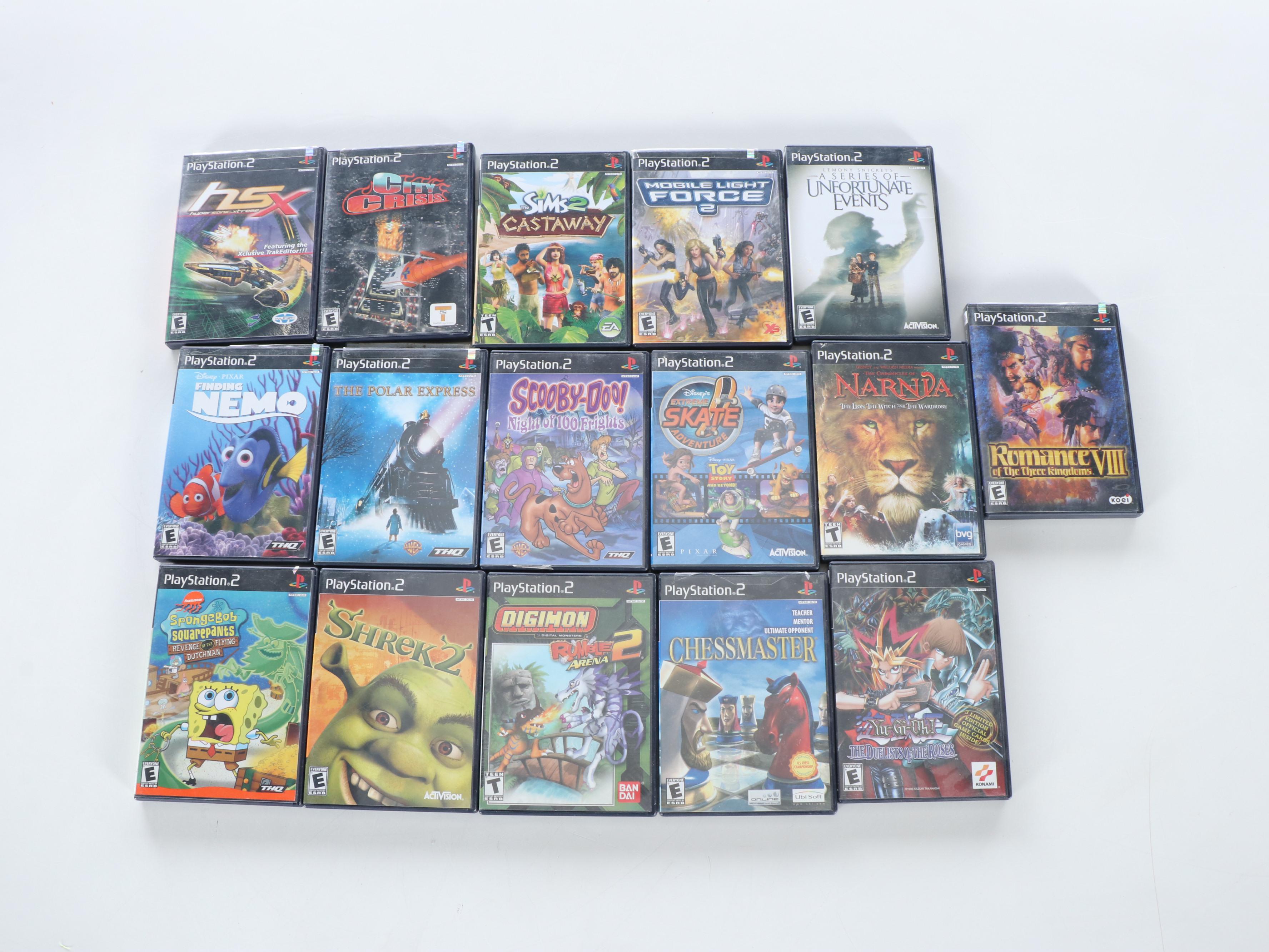 Sony Playstation 2 with Controllers, Guitars, Games and More Accessories