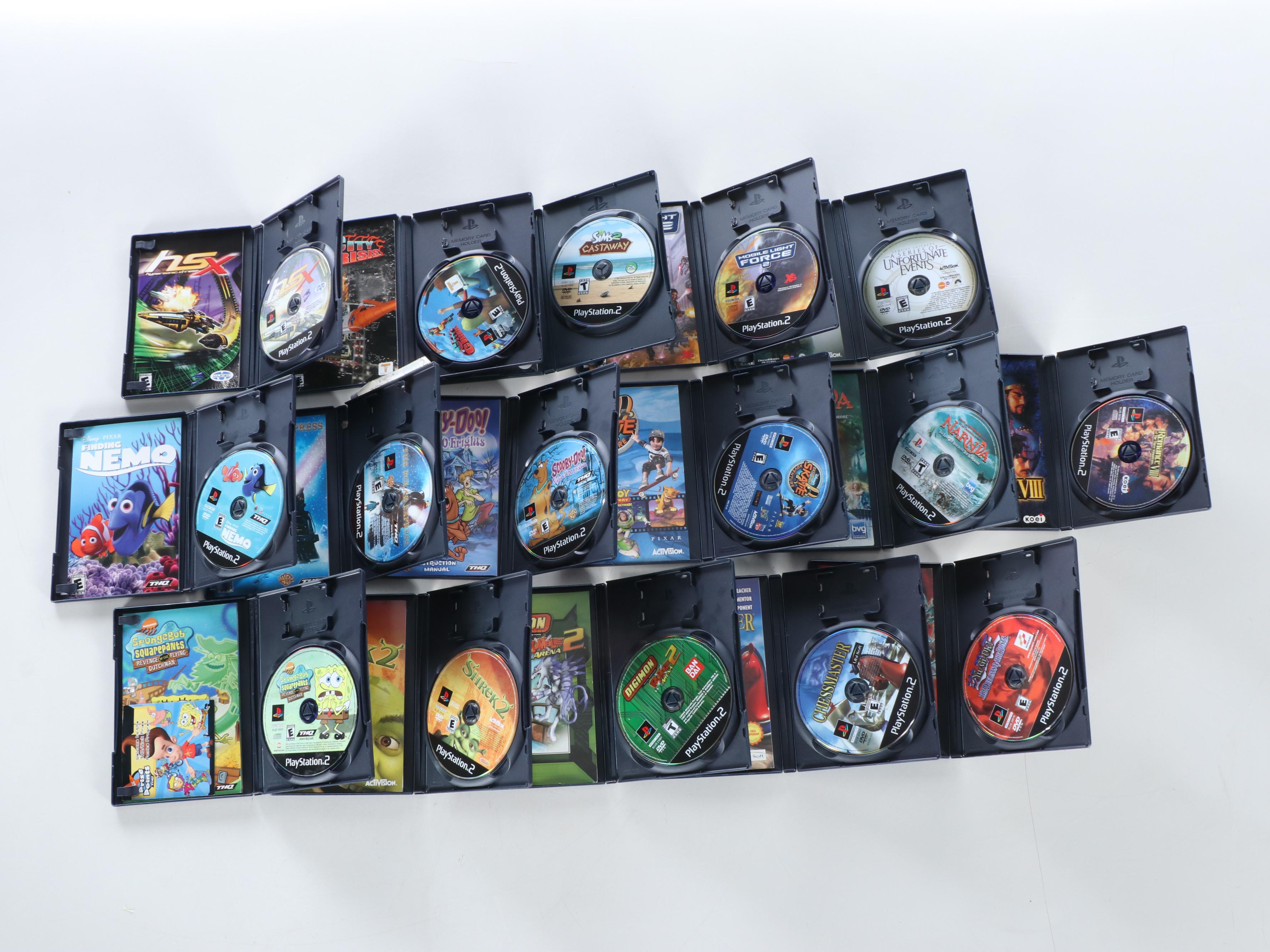 Sony Playstation 2 with Controllers, Guitars, Games and More Accessories