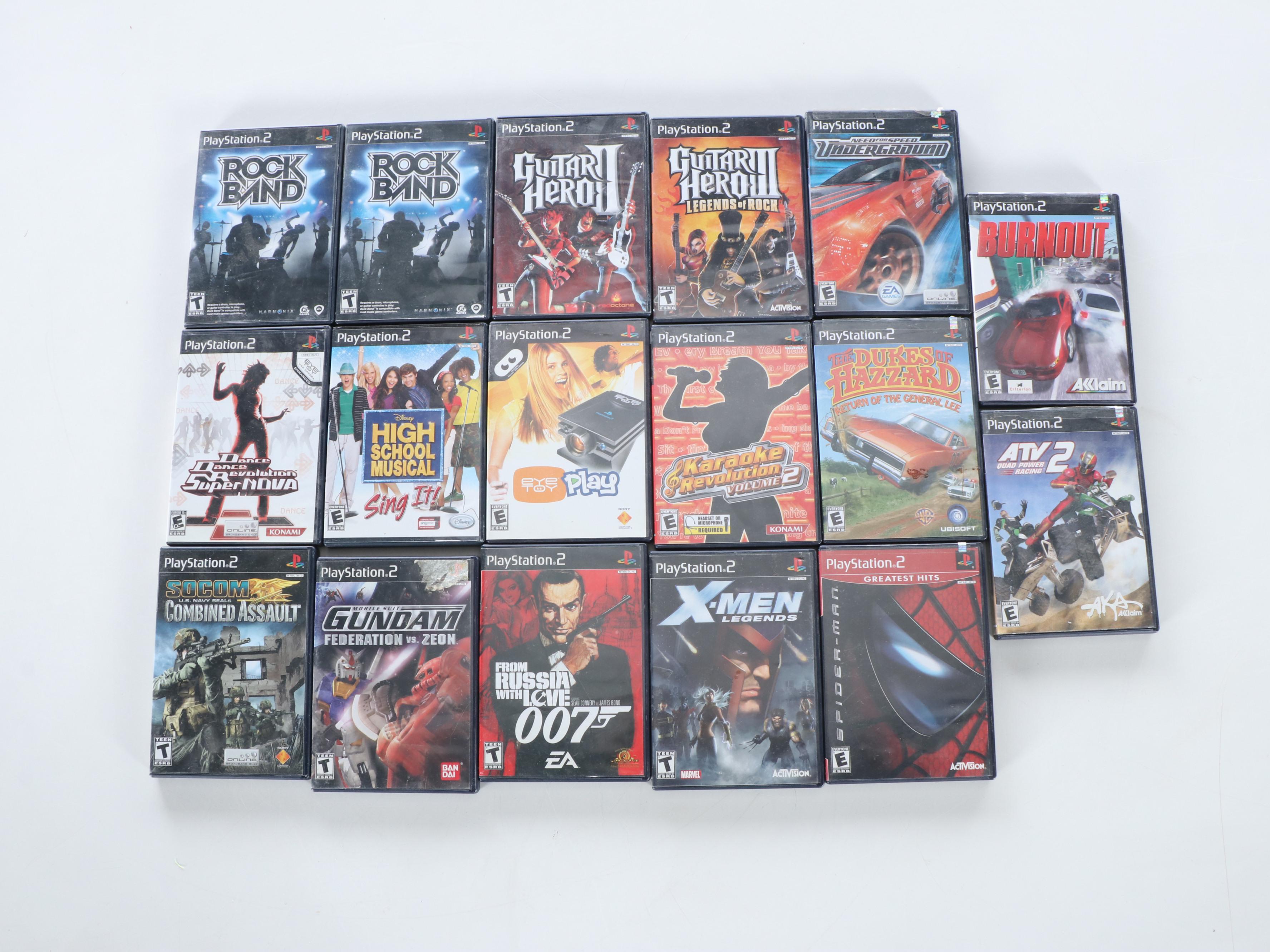 Sony Playstation 2 with Controllers, Guitars, Games and More Accessories