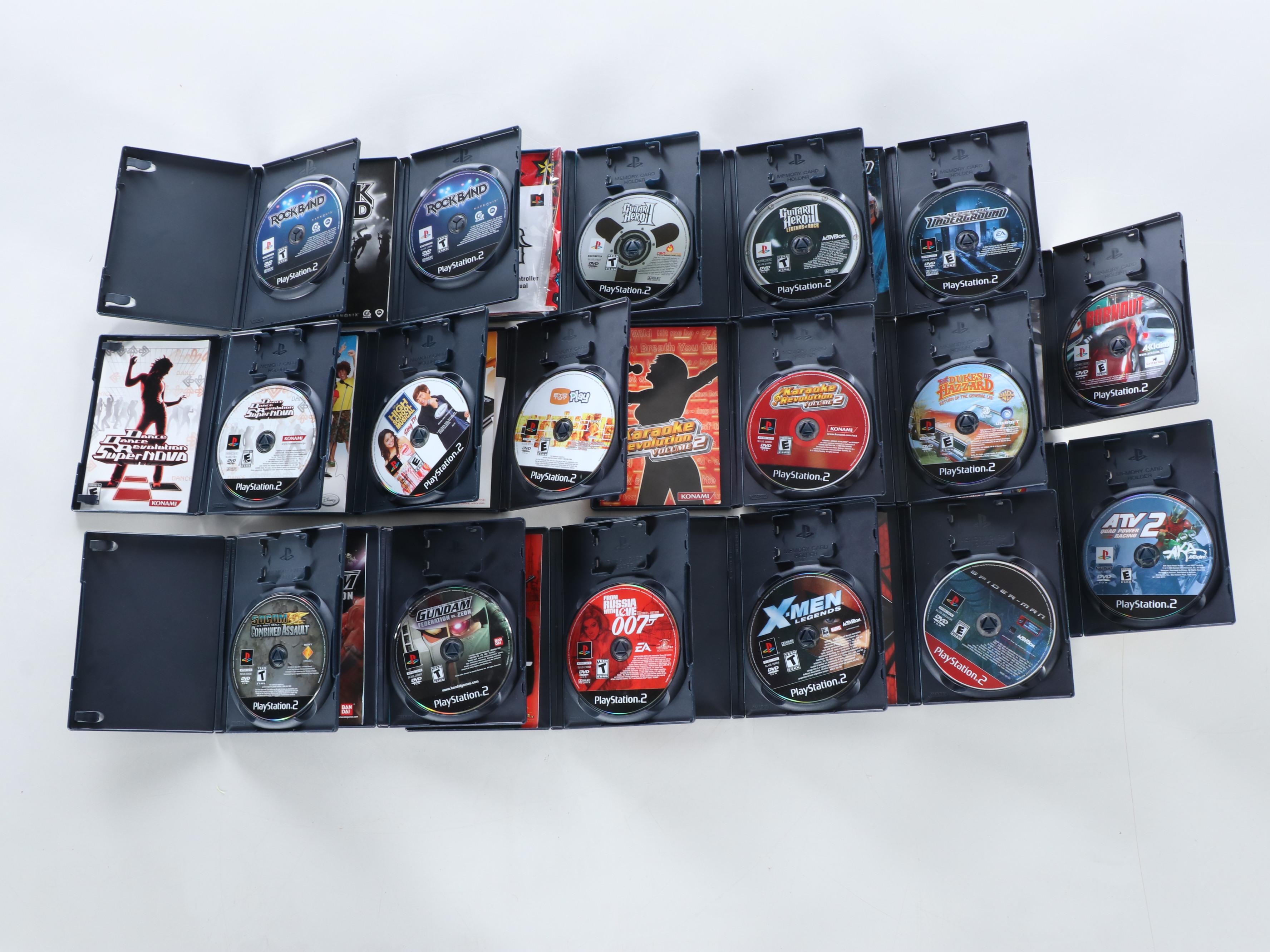 Sony Playstation 2 with Controllers, Guitars, Games and More Accessories