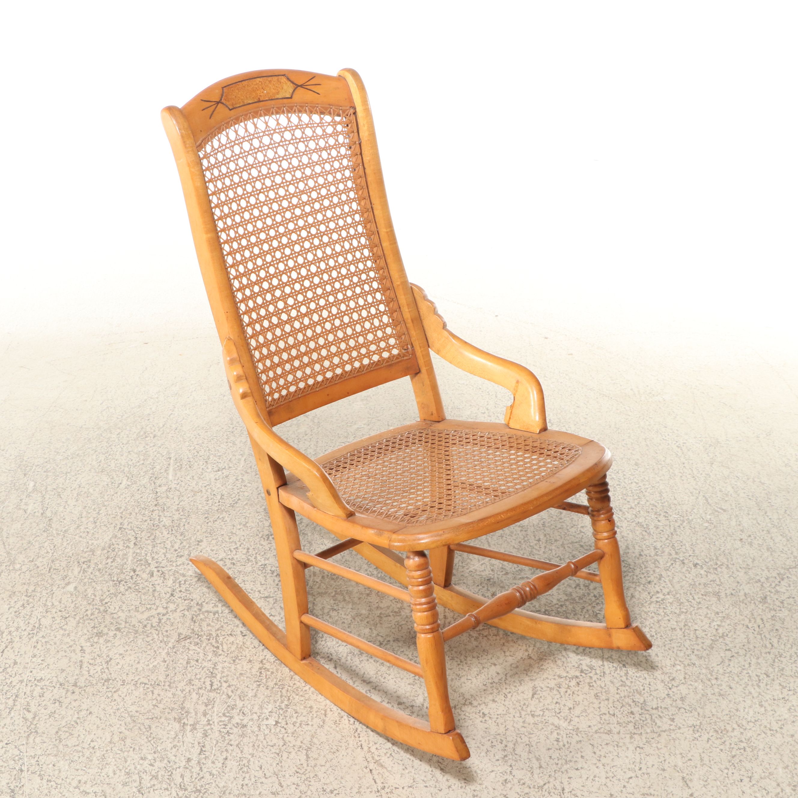 Eastlake Style Rocking and Jacobean Revival Style Cane Bottom Dining Chairs