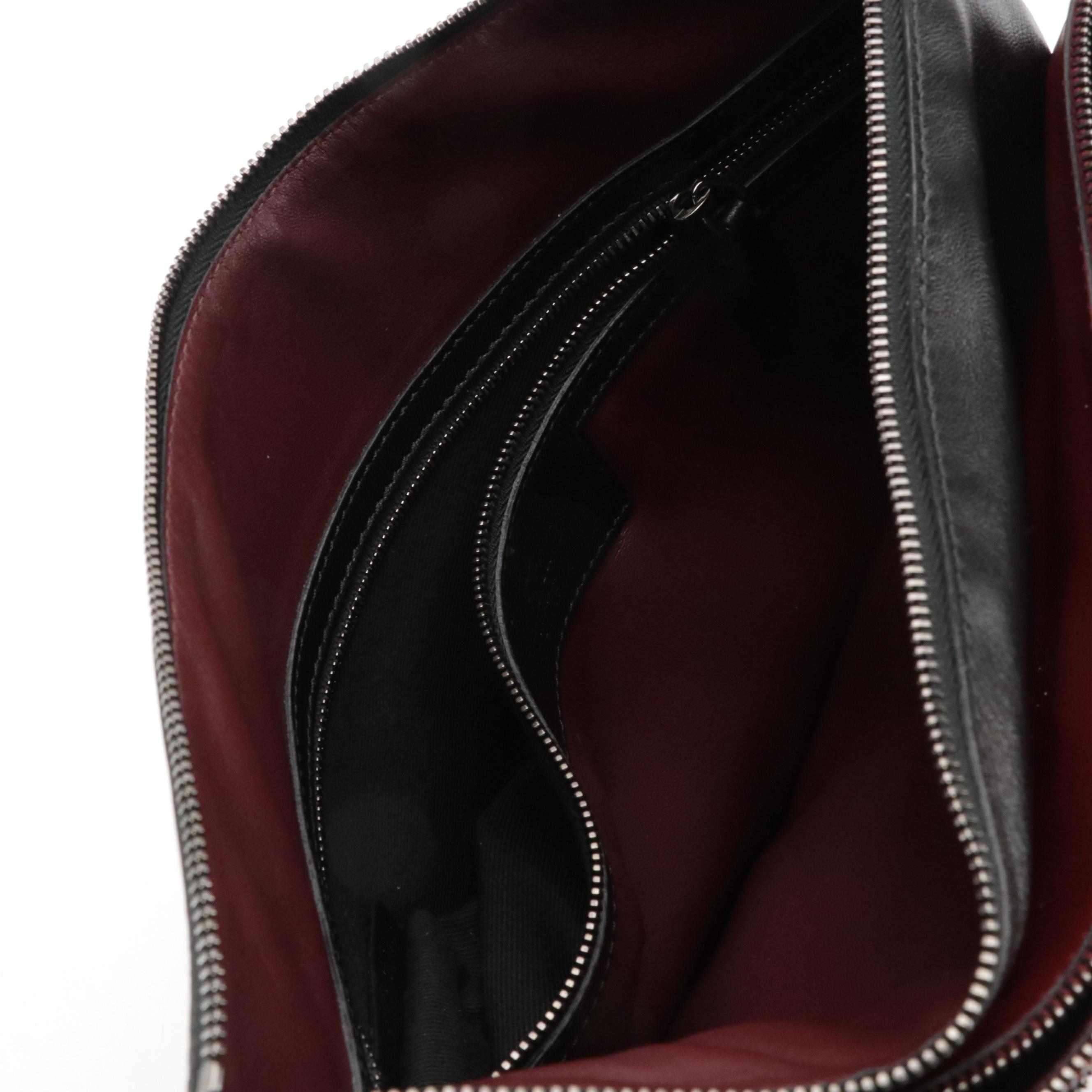 Valentino Garavani Rockstud Triple Zip Clutch in Calfskin Leather