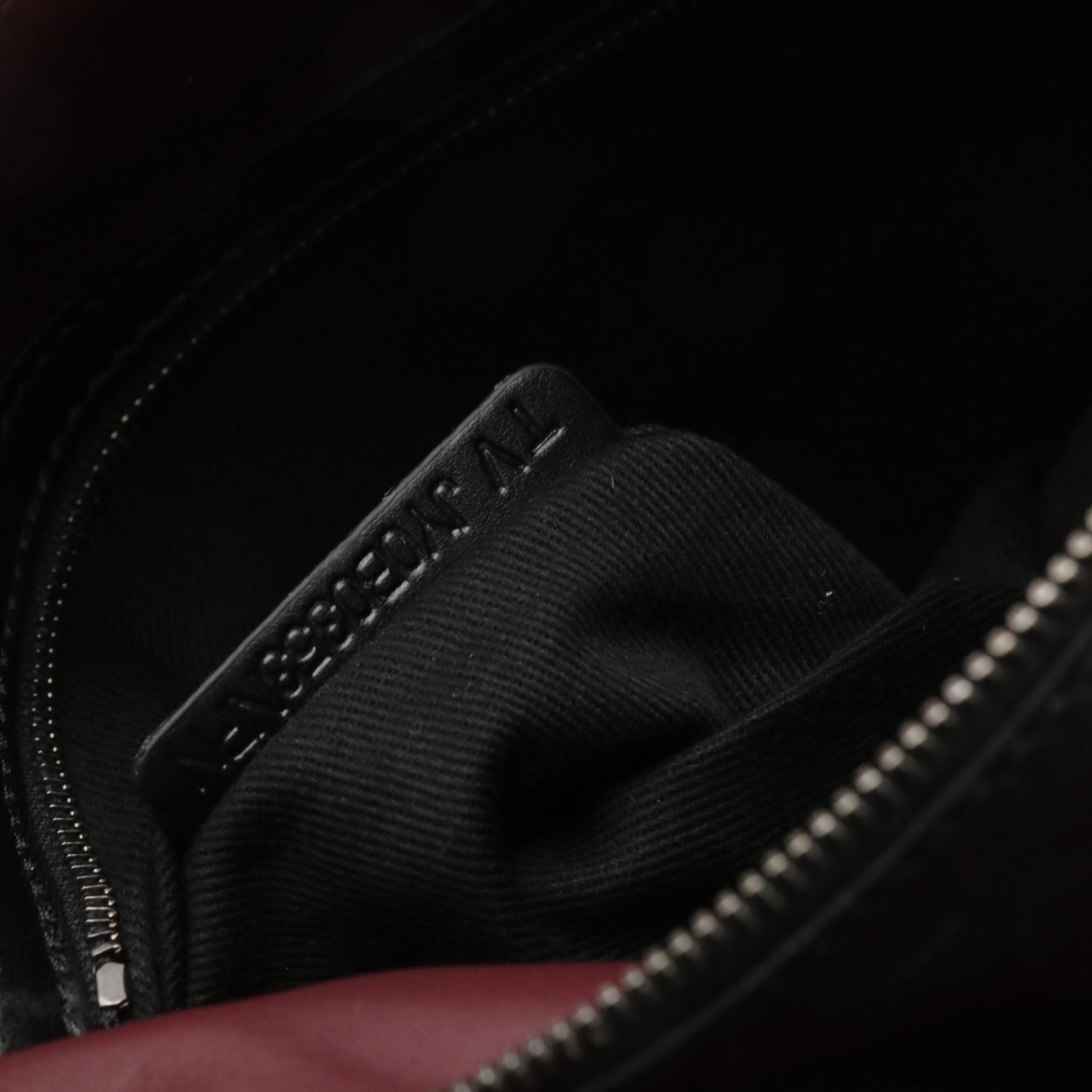 Valentino Garavani Rockstud Triple Zip Clutch in Calfskin Leather