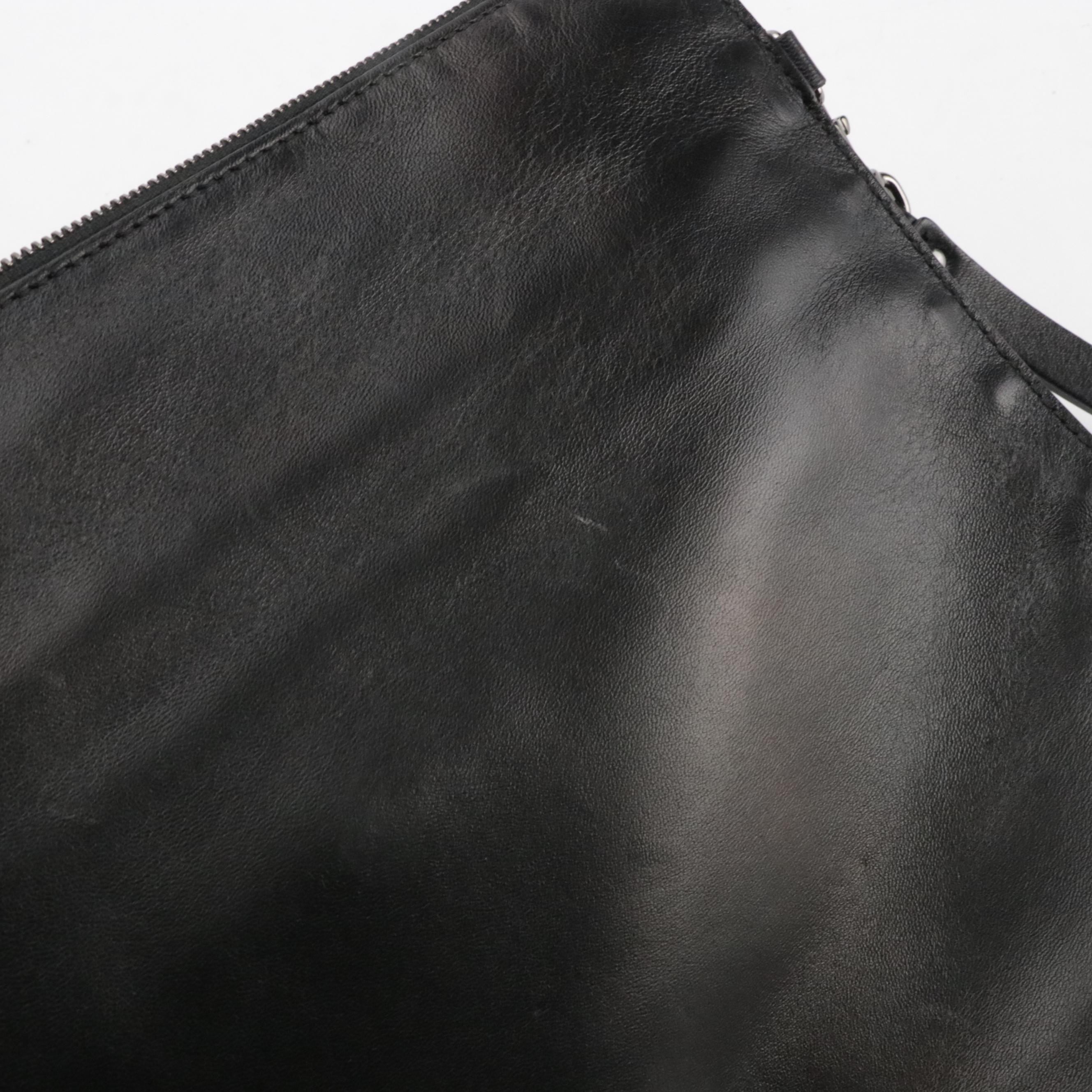 Valentino Garavani Rockstud Triple Zip Clutch in Calfskin Leather