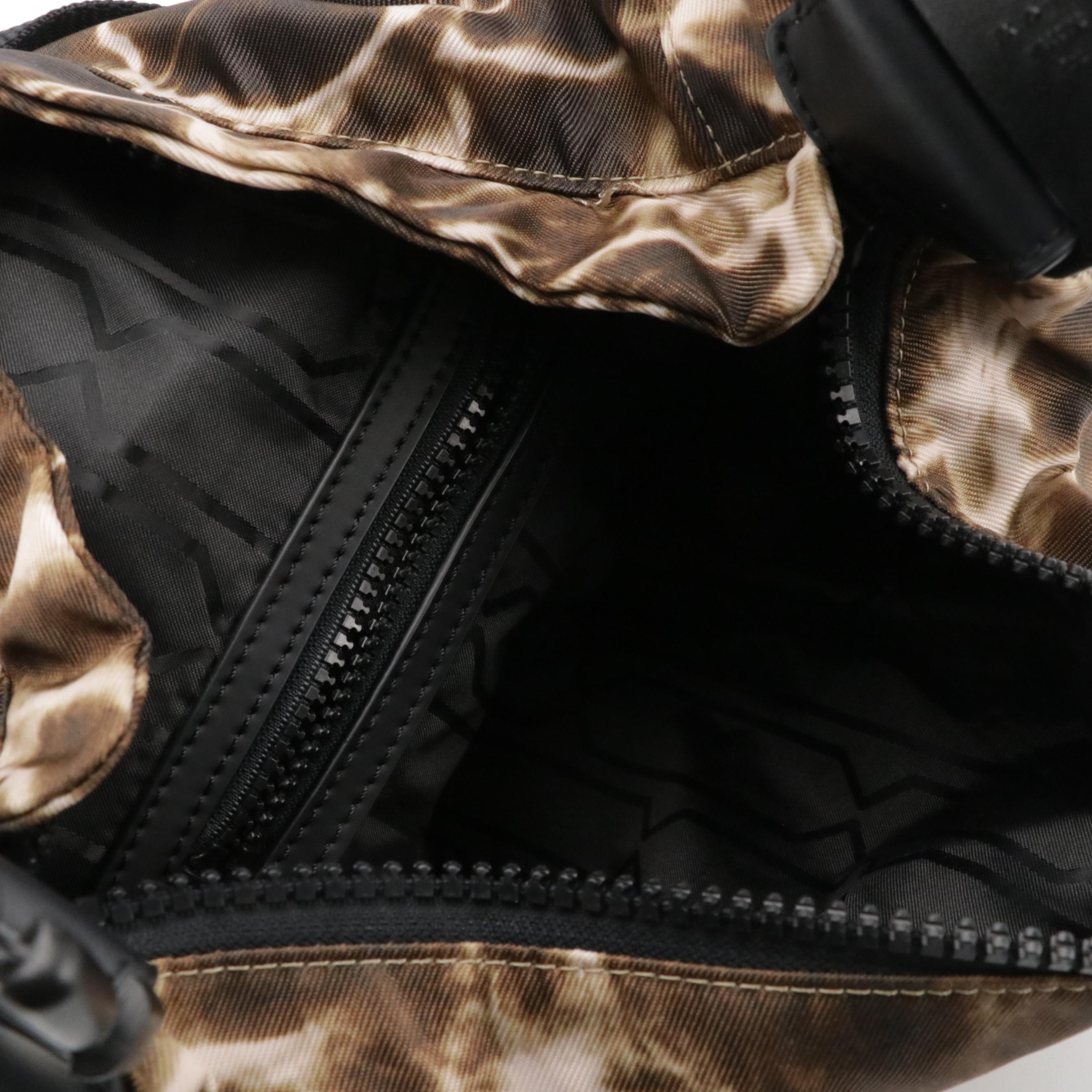 Hunter Top Clip Backpack in Water Print Nylon Canvas with Tumi Dust Bags