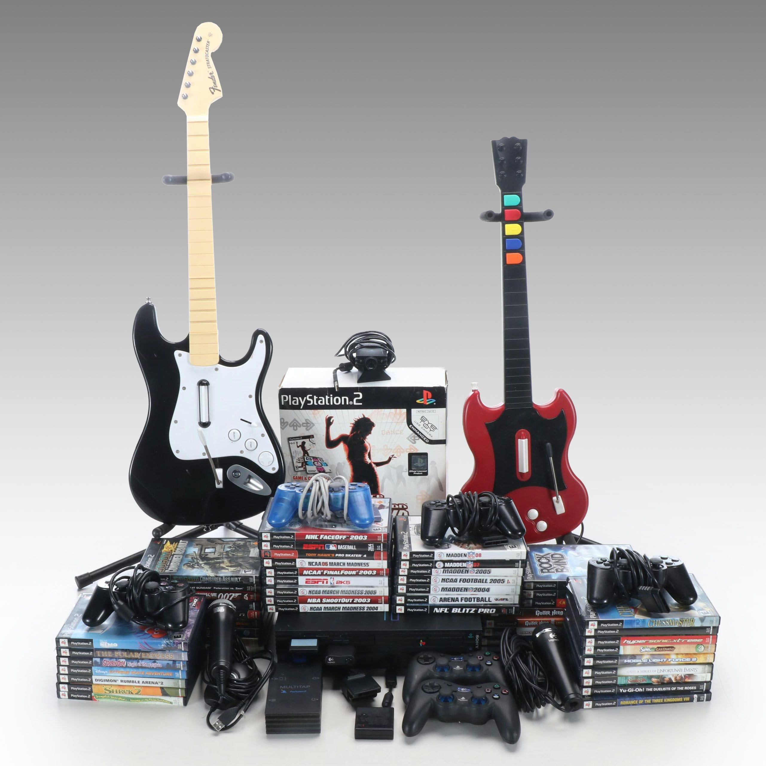 Sony Playstation 2 with Controllers, Guitars, Games and More Accessories