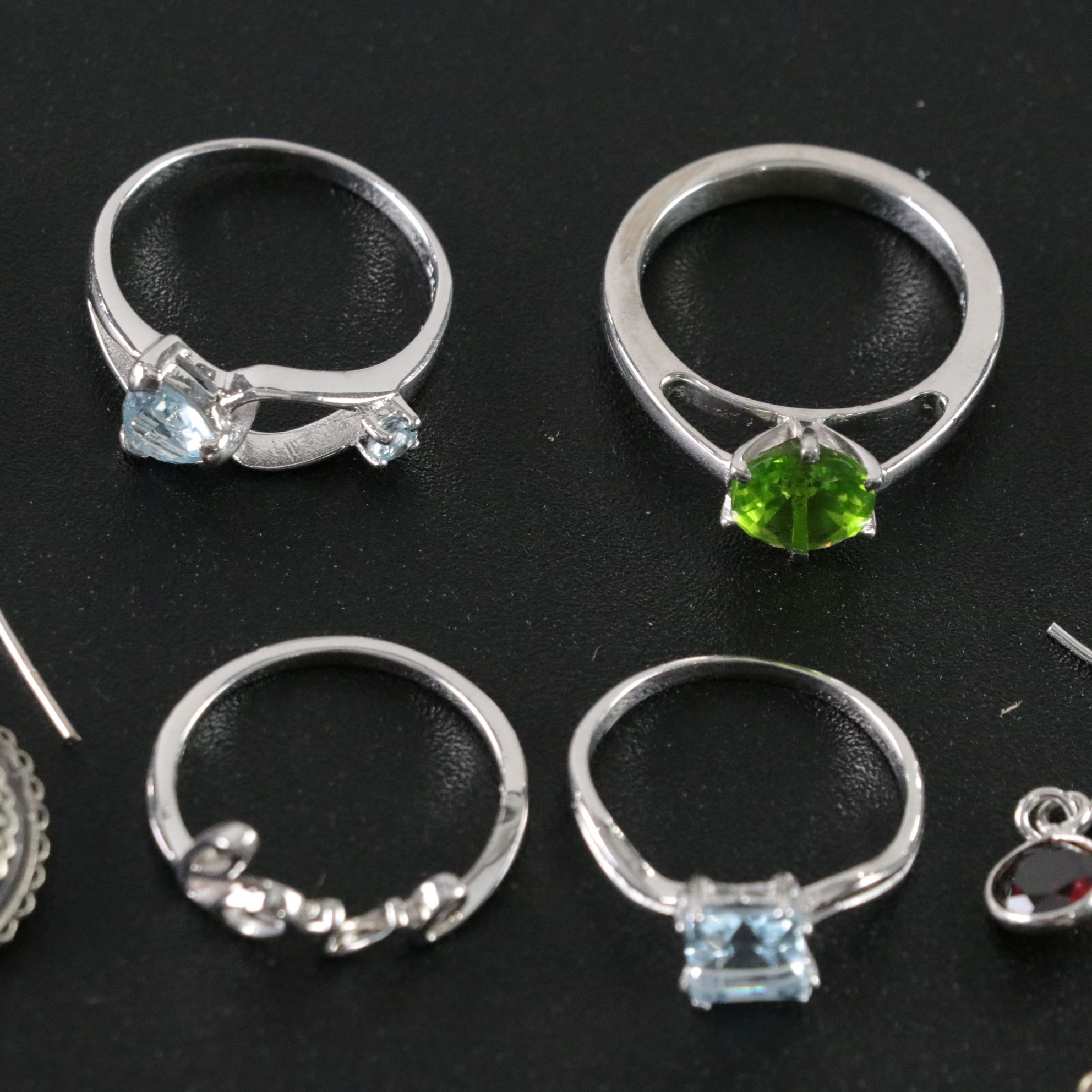 14 Assorted Sterling Silver Rings, Necklaces, Earrings, and Pendants