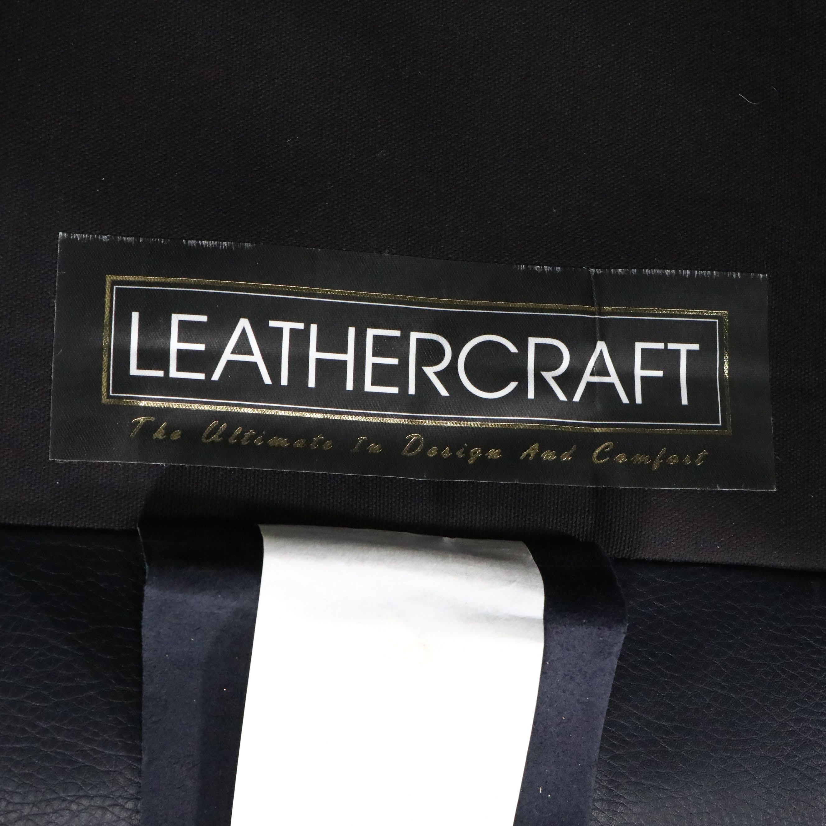 Leathercraft Quilted Leather Upholstered Recliner with Nailhead Trim