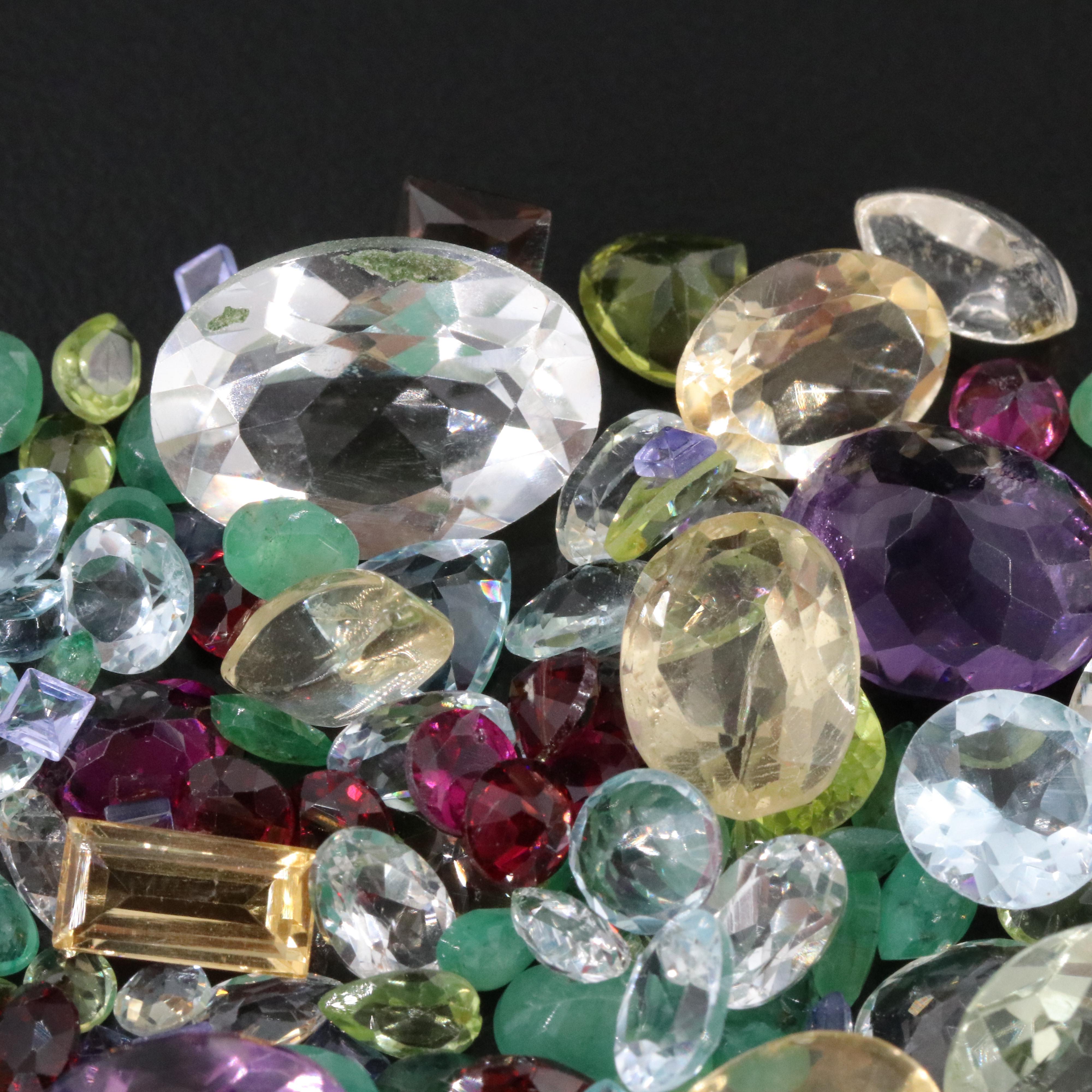 Loose 78.23 CTW Gemstone Lot Including Amethyst, Emerald and Garnet