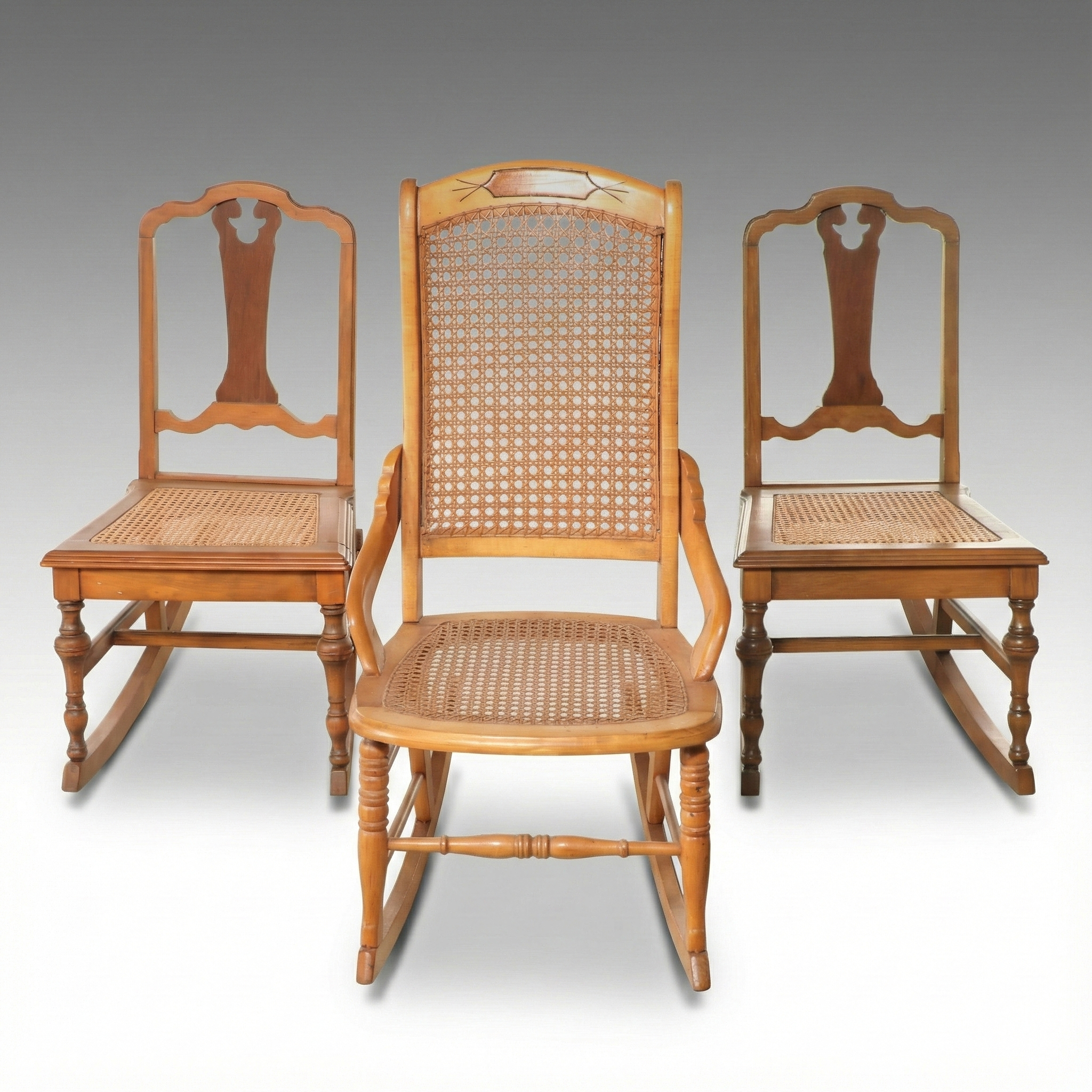 Eastlake Style Rocking and Jacobean Revival Style Cane Bottom Dining Chairs