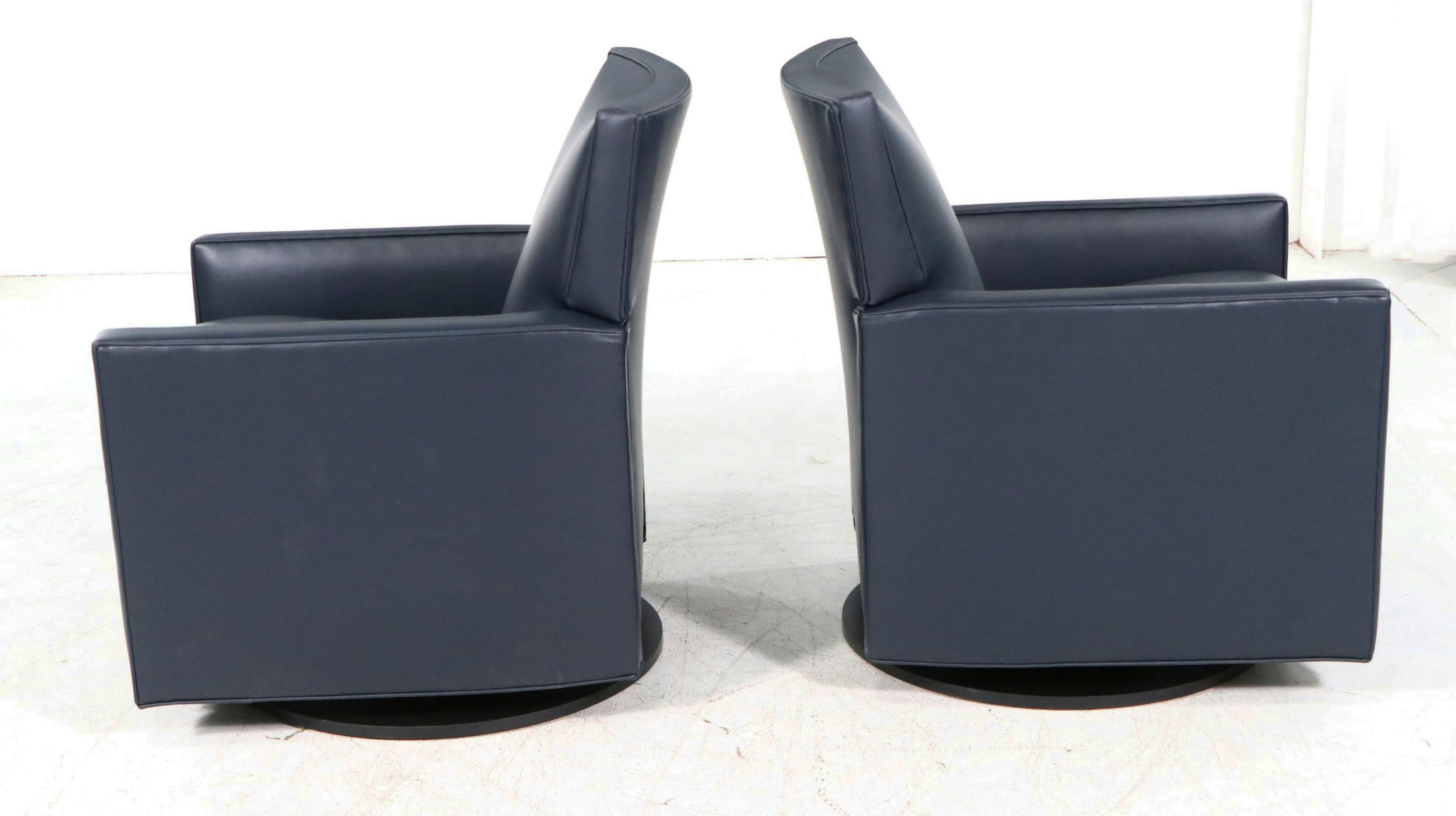 Pair of Arhaus "Tribeca Navy" Leather Upholstered Swivel Recliners