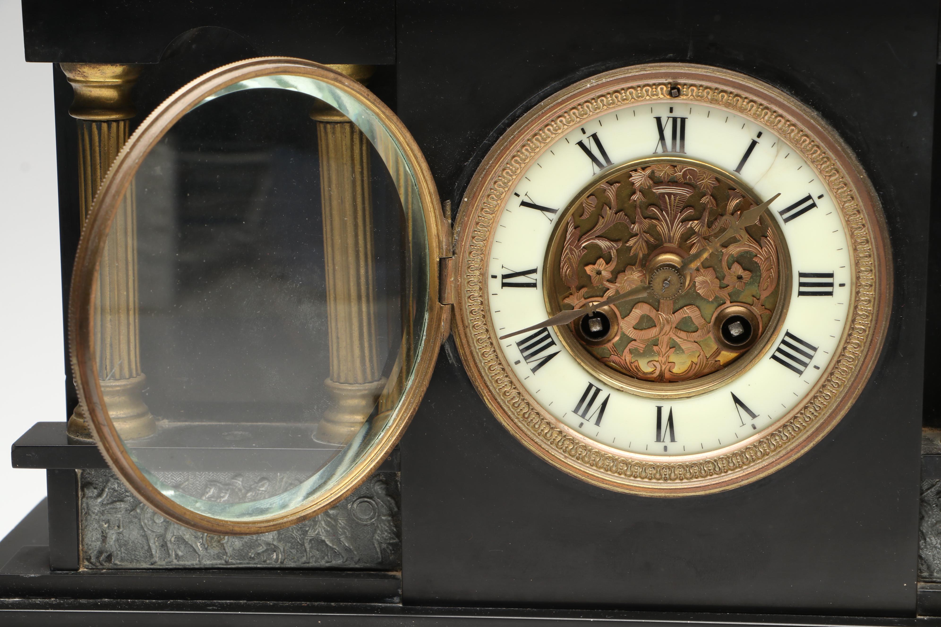 Ansonia Neoclassical Style Black Stone and Patinated Metal Mantel Clock