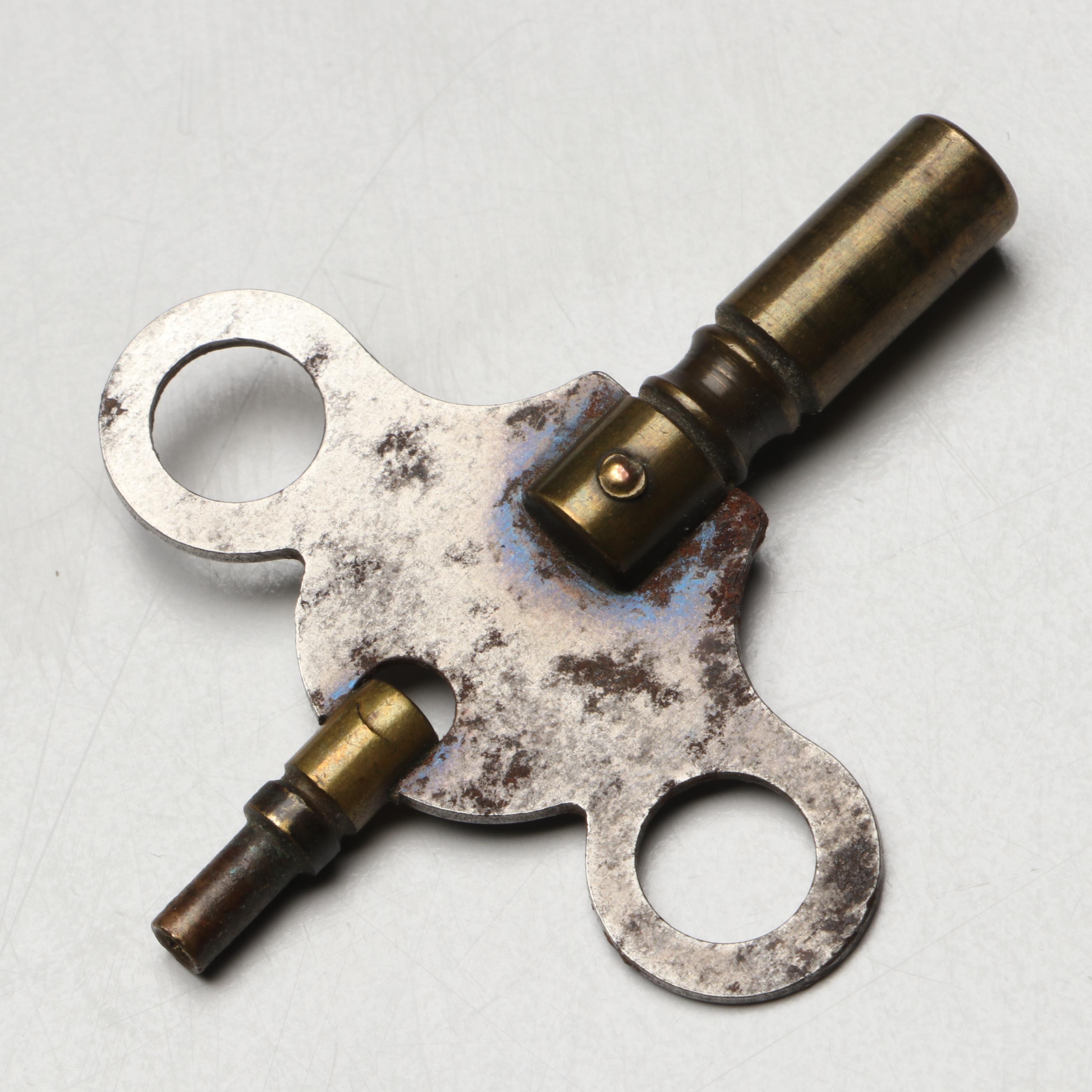 Ansonia Neoclassical Style Black Stone and Patinated Metal Mantel Clock