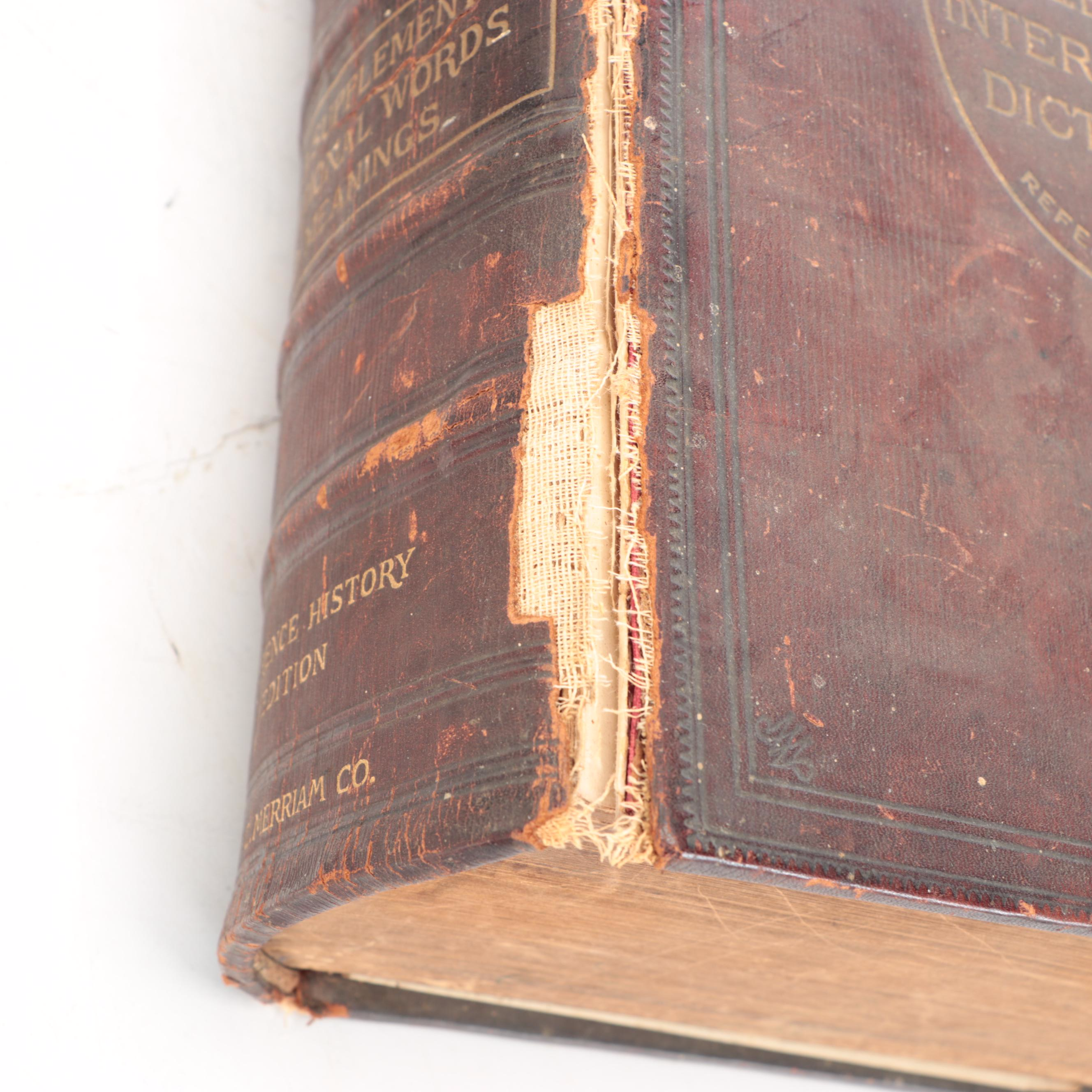 "Webster's International Dictionary" with Wooden Dictionary Holder