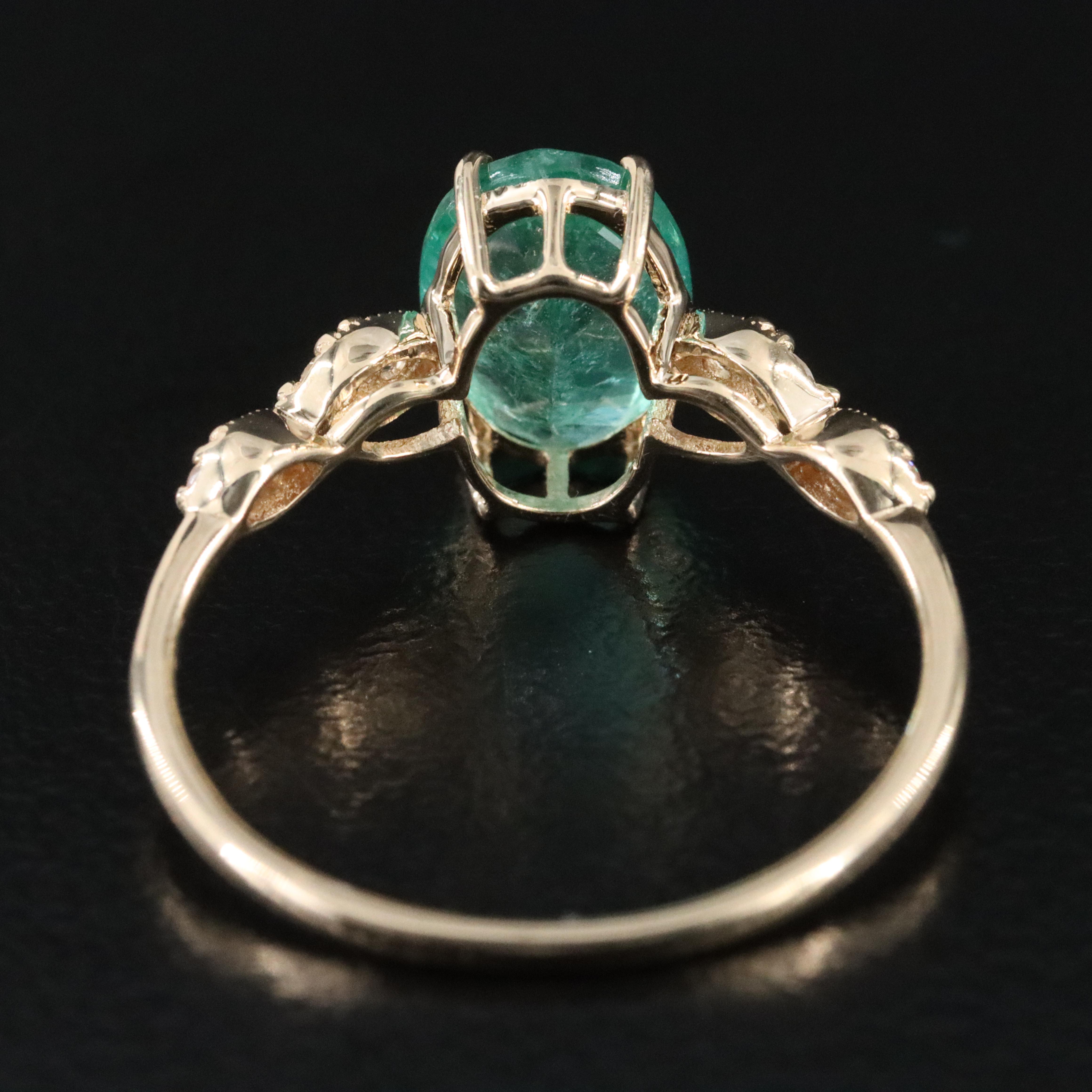 14K 1.45 CT Emerald and White Sapphire Ring