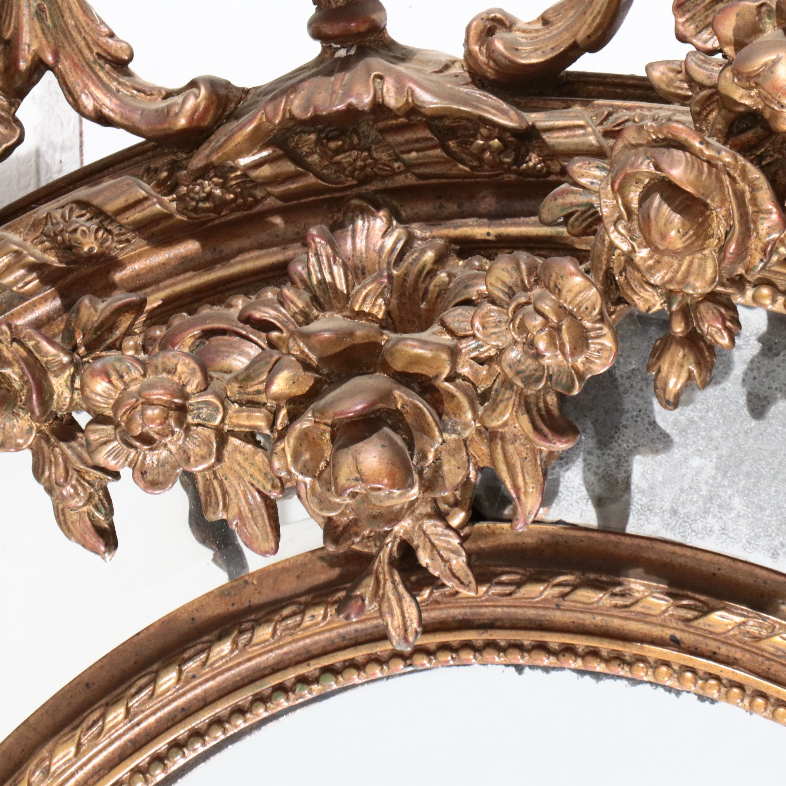 Napoleon III Carved Giltwood Oval Marginal Mirror, Late 19th Century