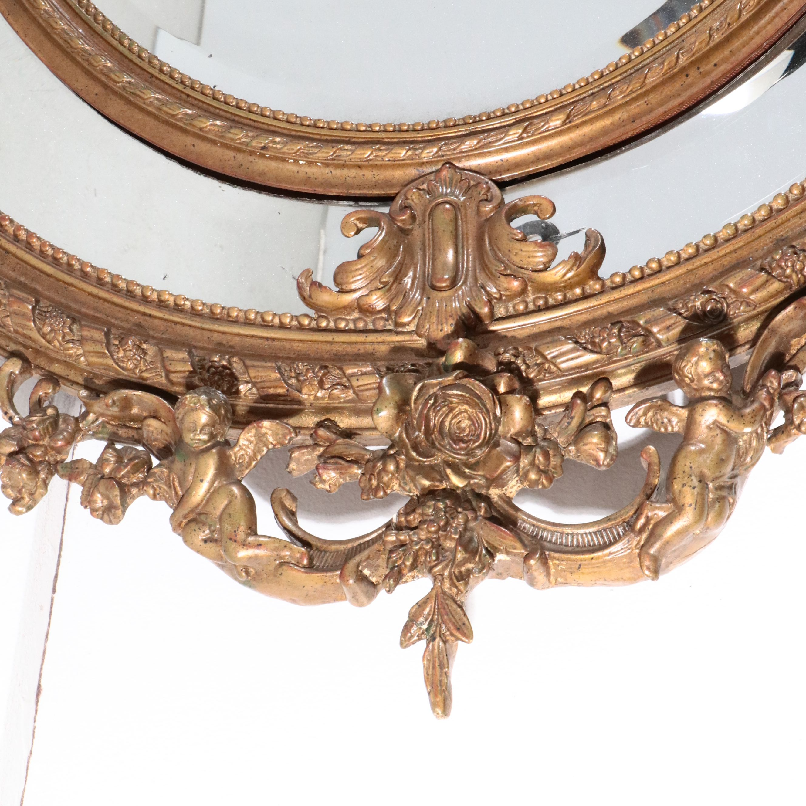 Napoleon III Carved Giltwood Oval Marginal Mirror, Late 19th Century