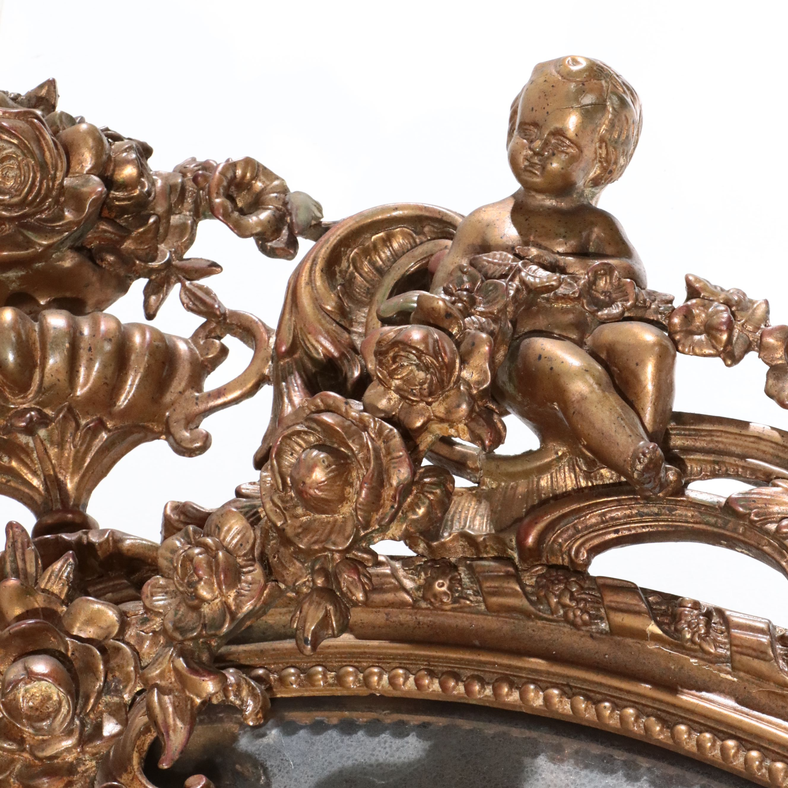 Napoleon III Carved Giltwood Oval Marginal Mirror, Late 19th Century