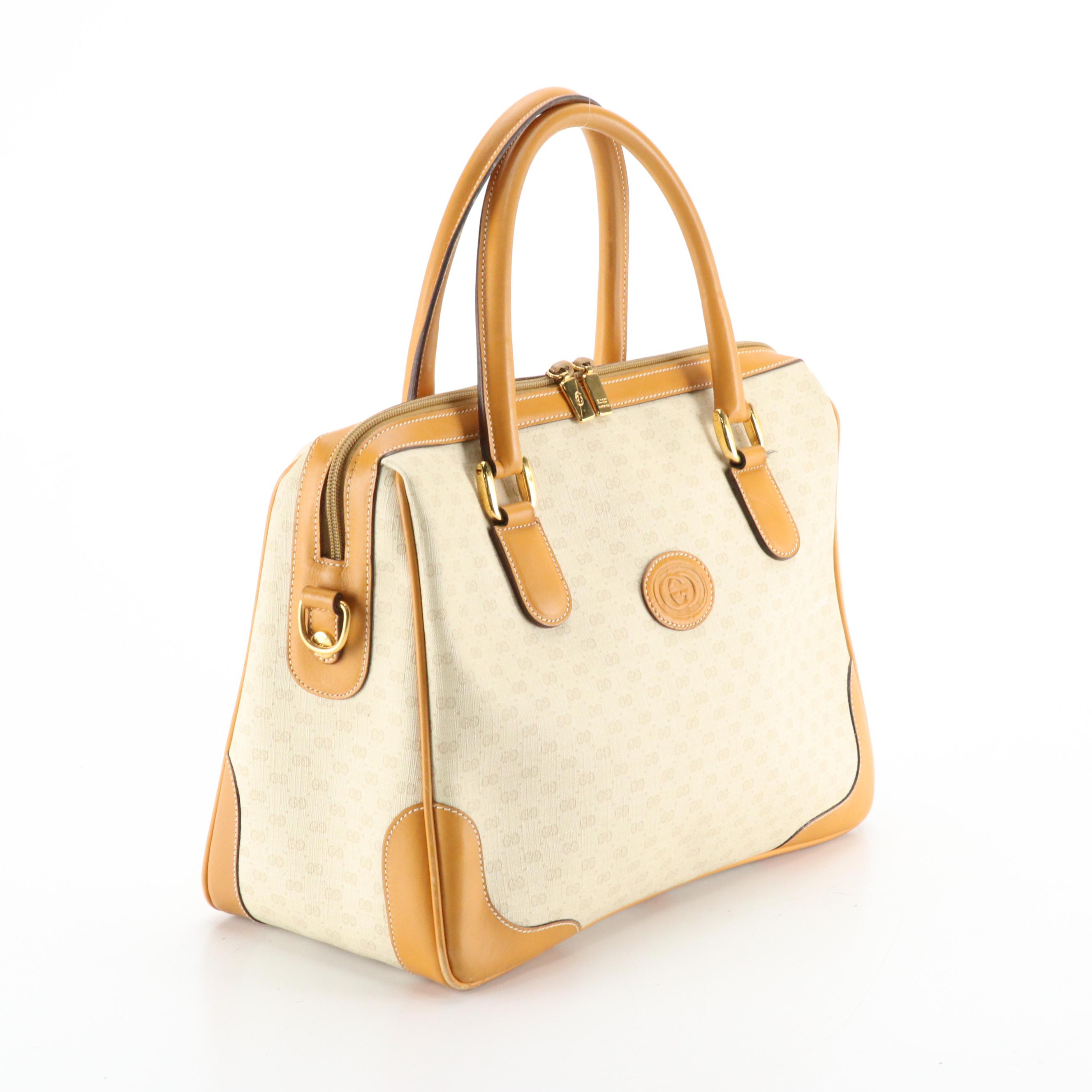 Gucci Interlocking GG Handbag in Micro GG Supreme Canvas with Tan Leather Trim