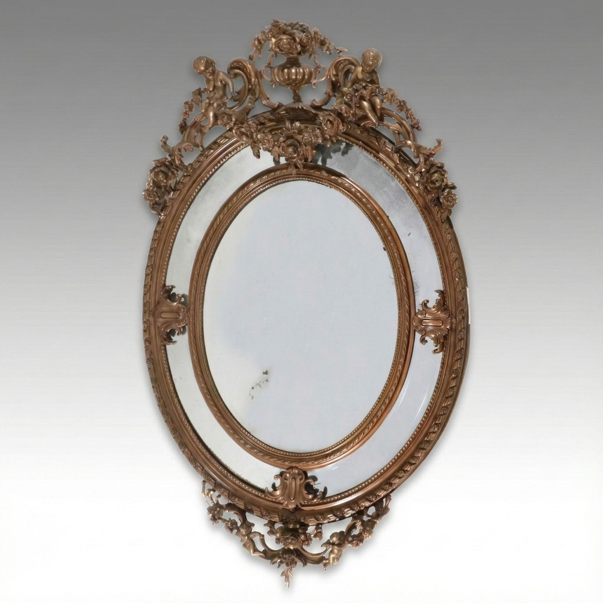 Napoleon III Carved Giltwood Oval Marginal Mirror, Late 19th Century