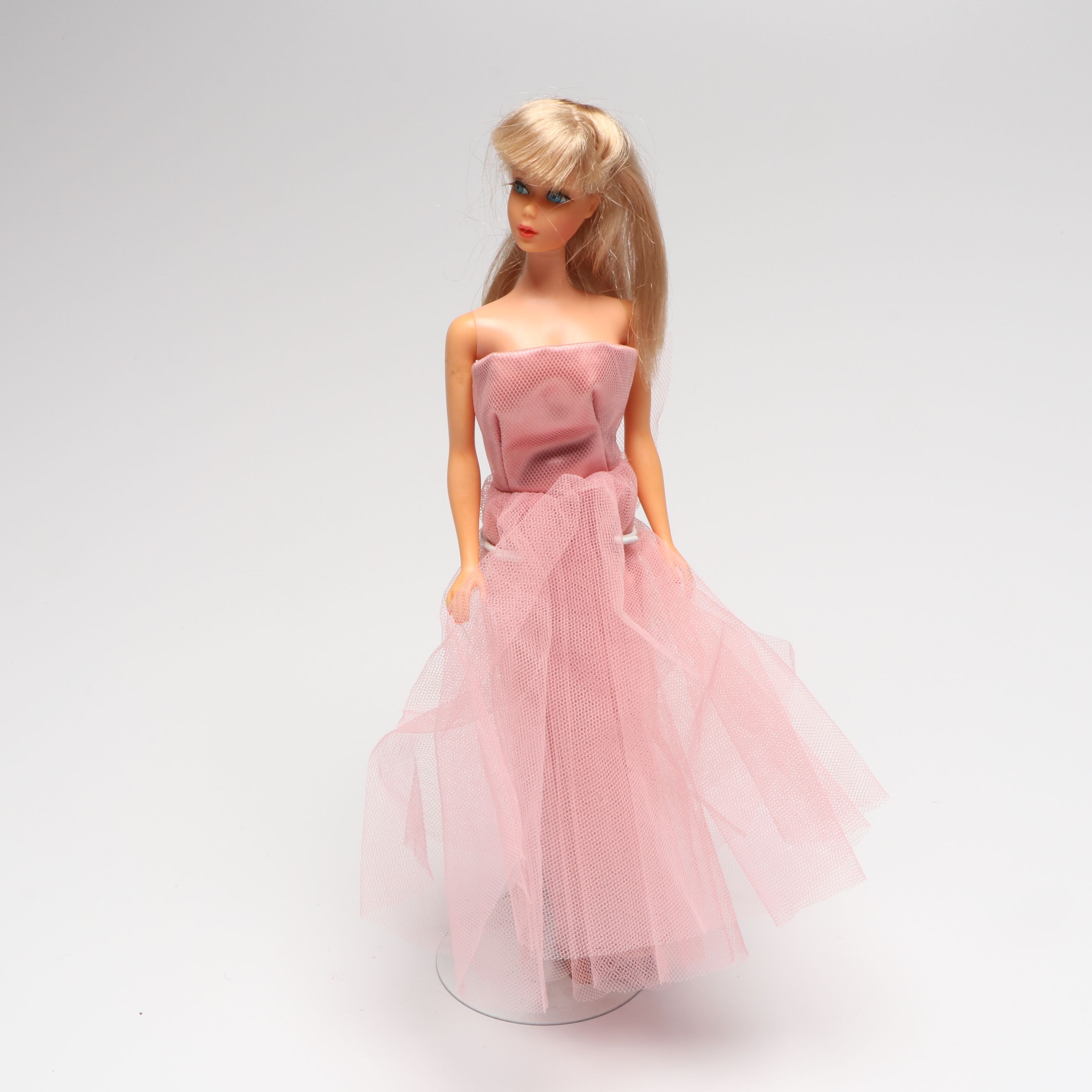 Mattel Barbie Doll with Clothes and Case, Mid-20th Century