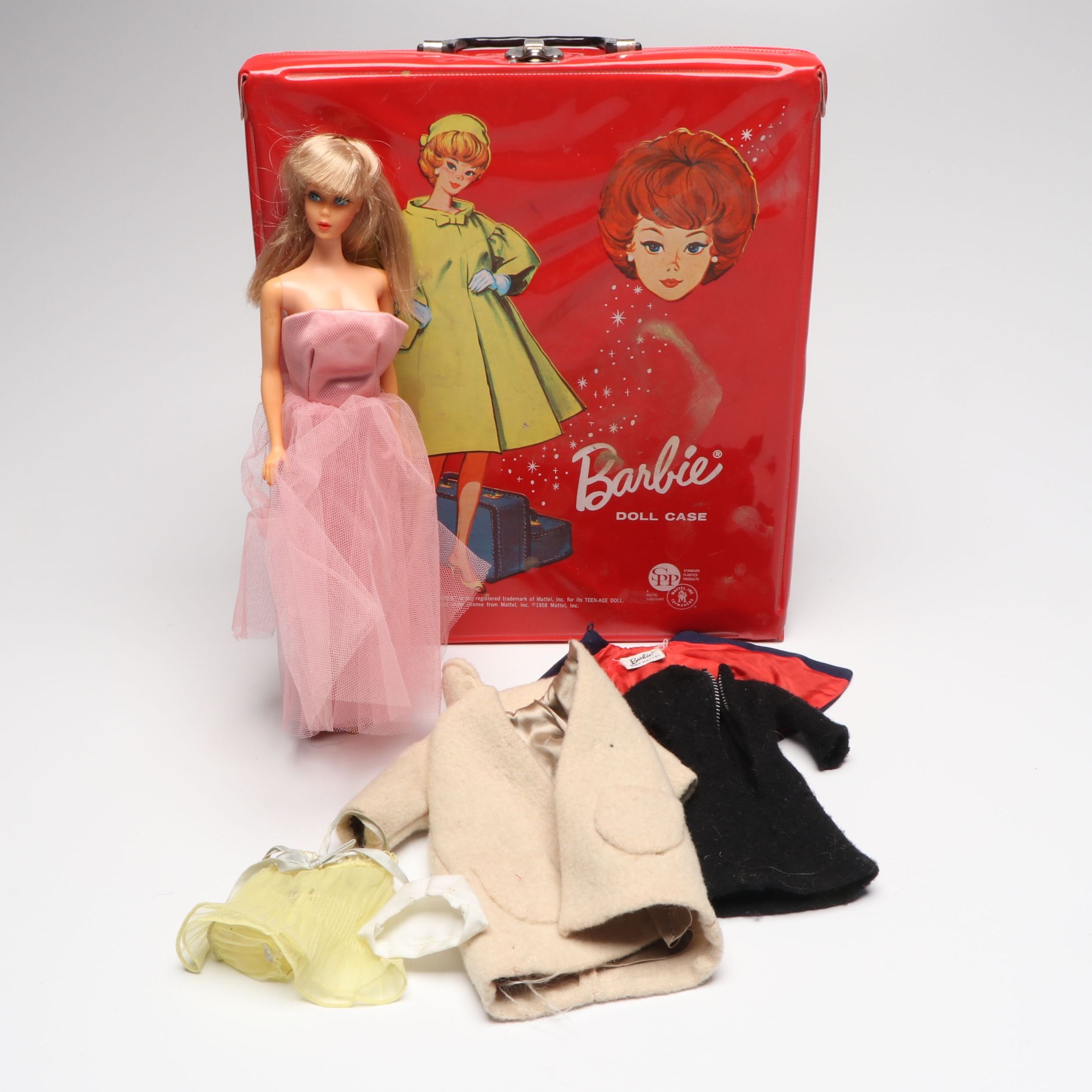 Mattel Barbie Doll with Clothes and Case, Mid-20th Century