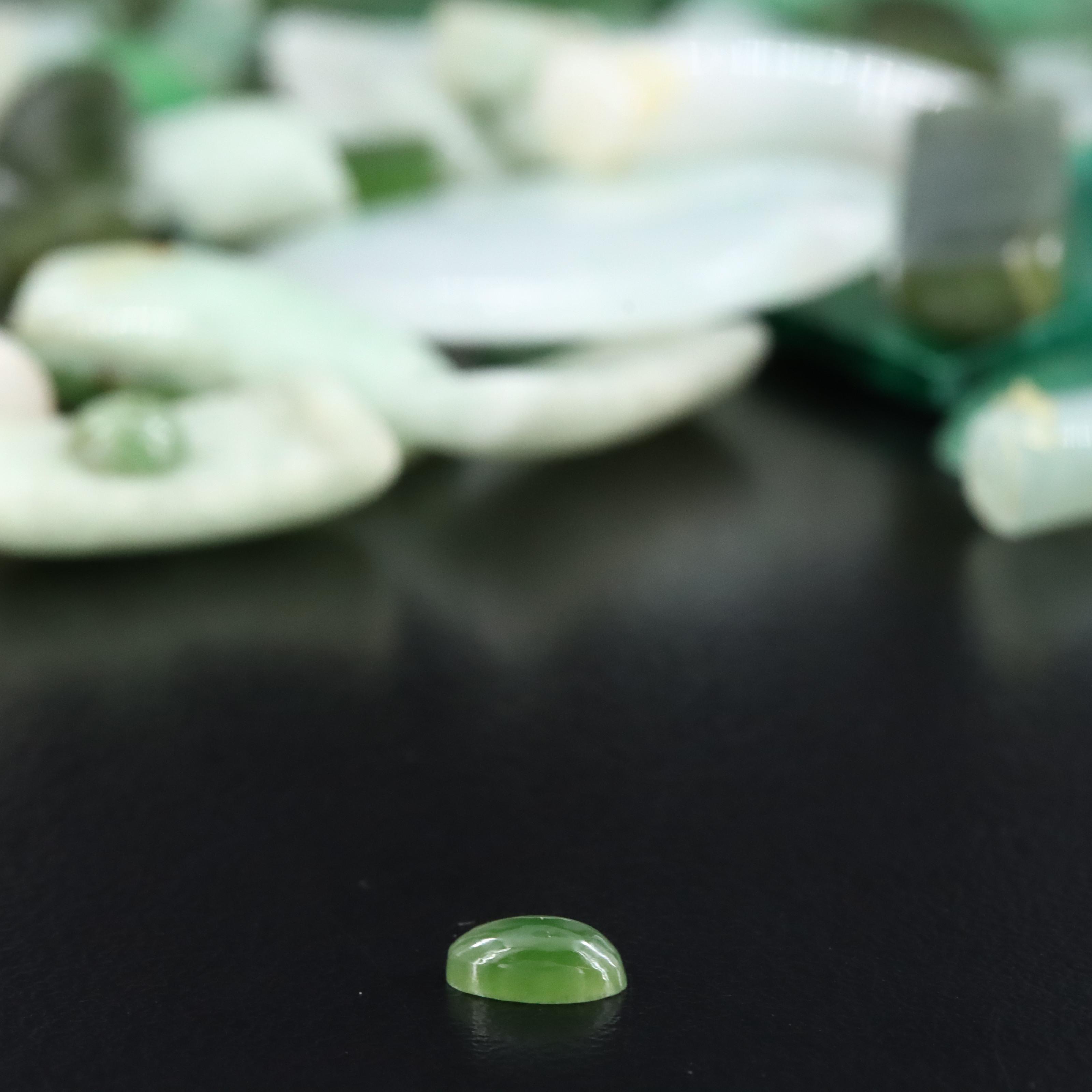 Loose Gemstones Featuring Jadeite, Quartz and Malachite