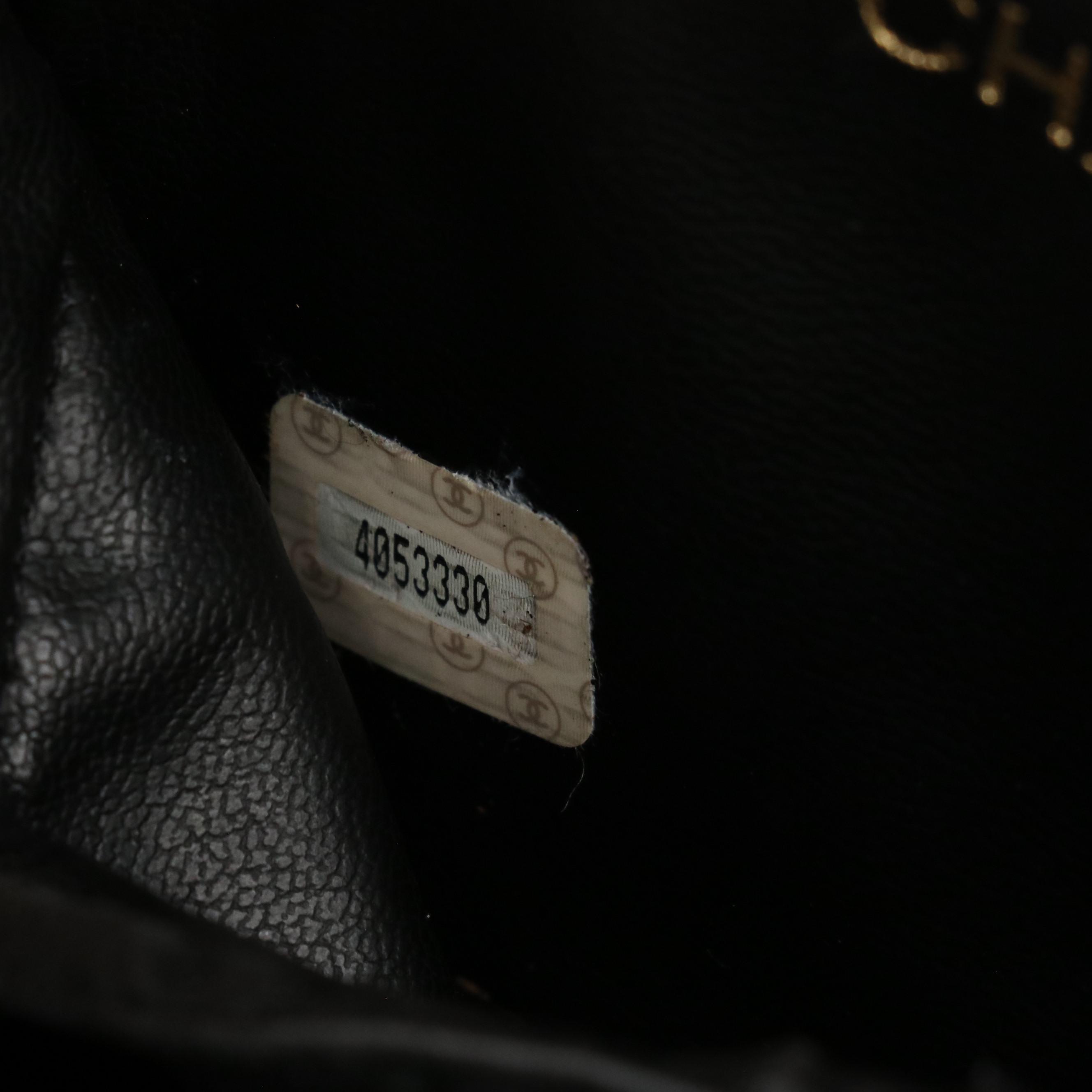 Chanel Zip-Around Vanity Bag in Black Leather with Quilted Trim