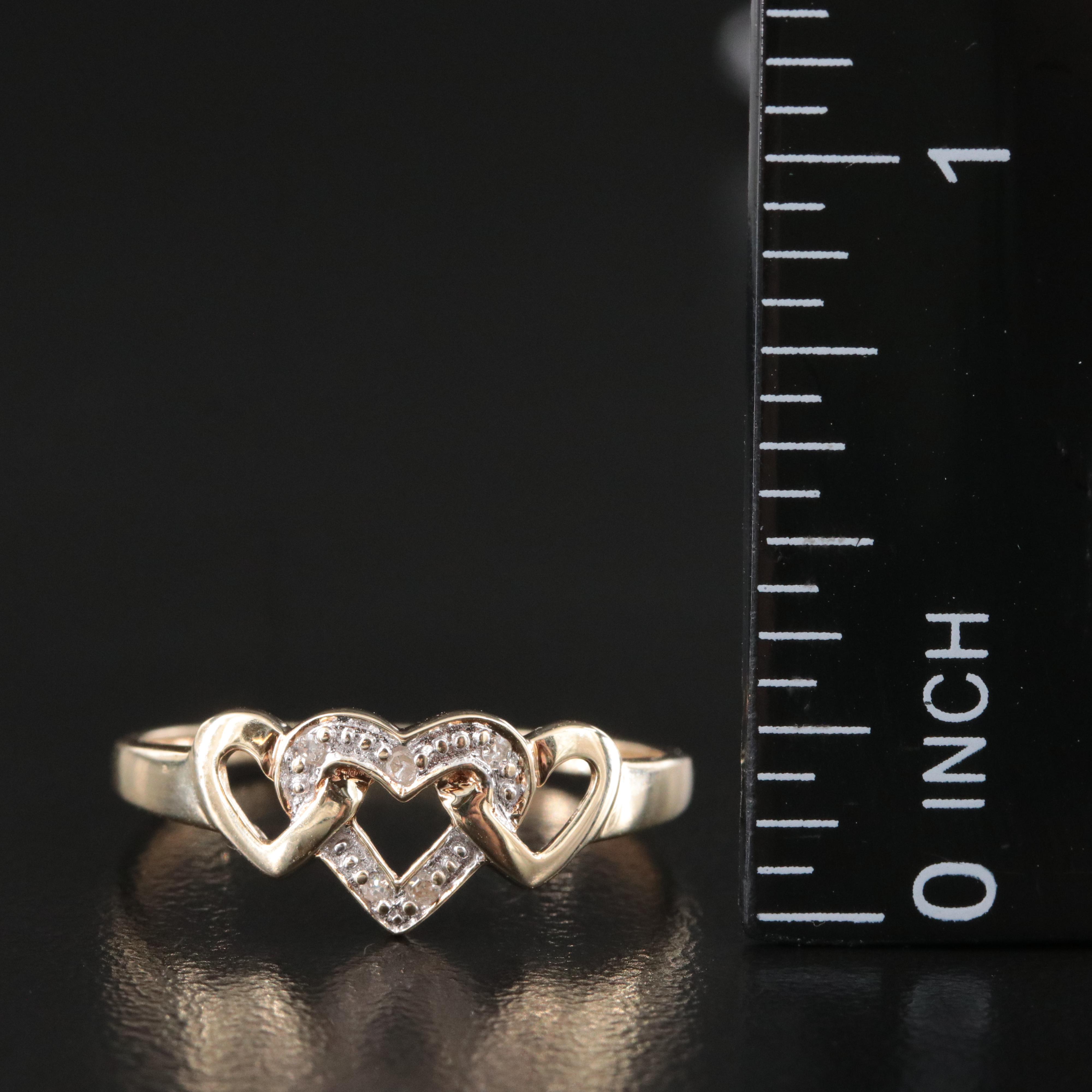10K 0.05 CTW Diamond Interlocking Heart Ring