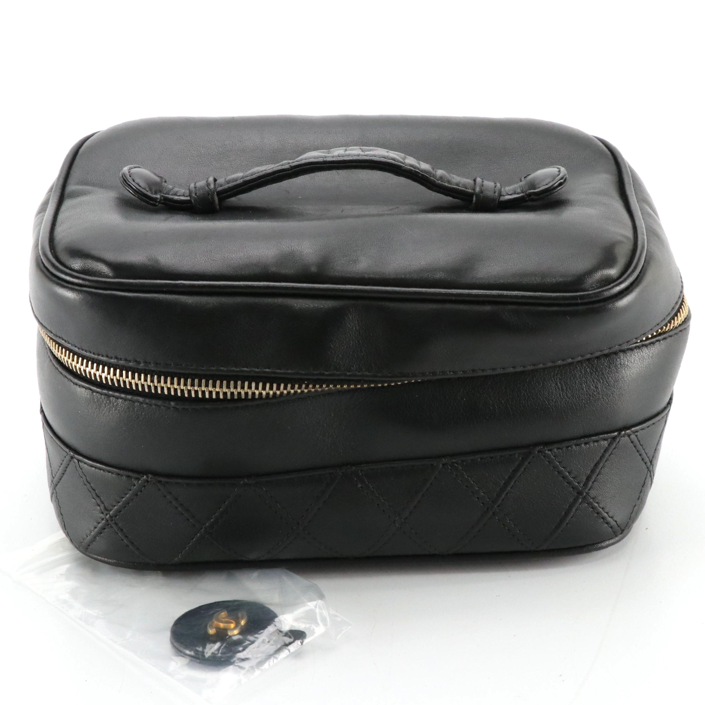 Chanel Zip-Around Vanity Bag in Black Leather with Quilted Trim