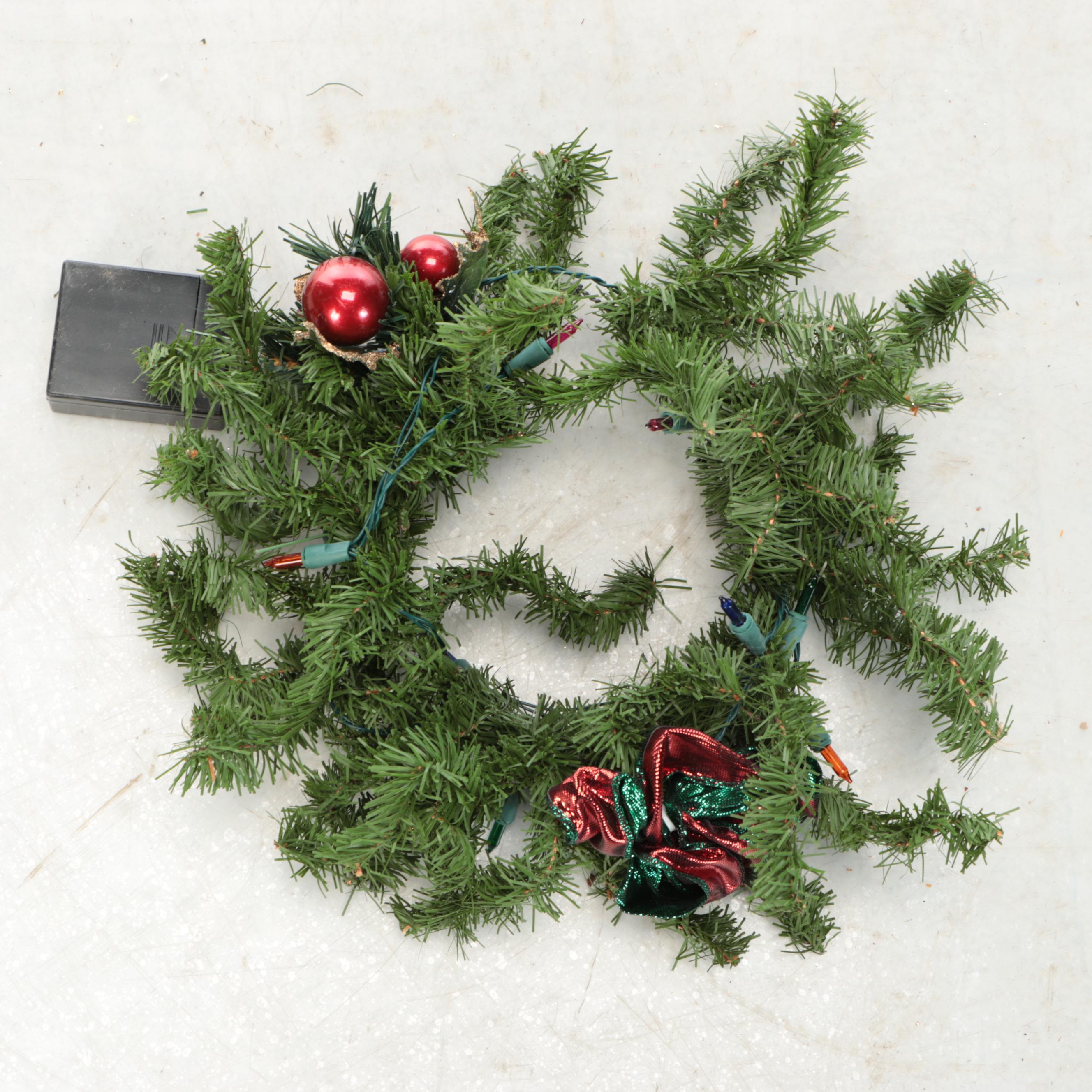 Artificial Evergreen and Poinsettia Christmas Wreaths