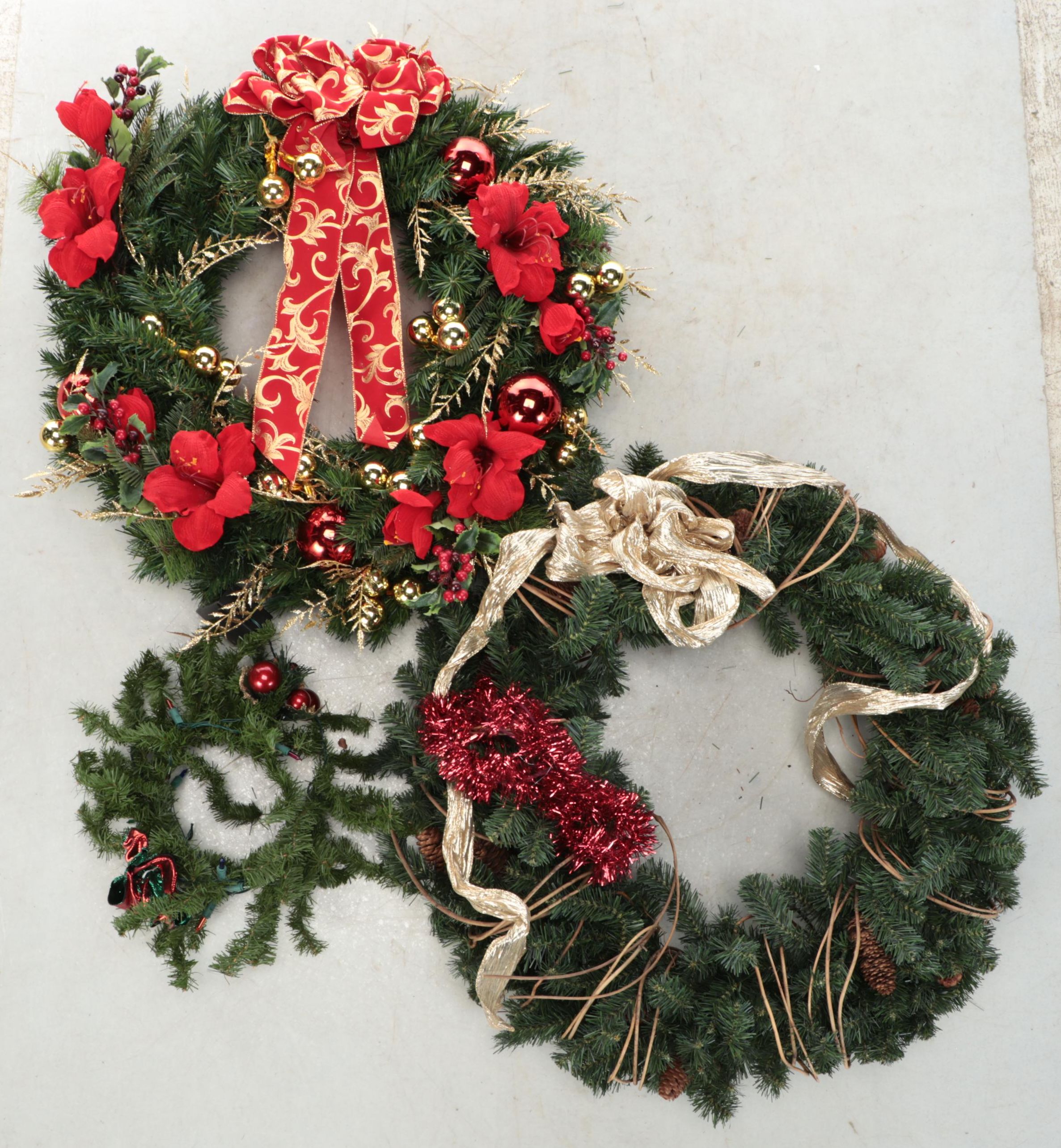 Artificial Evergreen and Poinsettia Christmas Wreaths