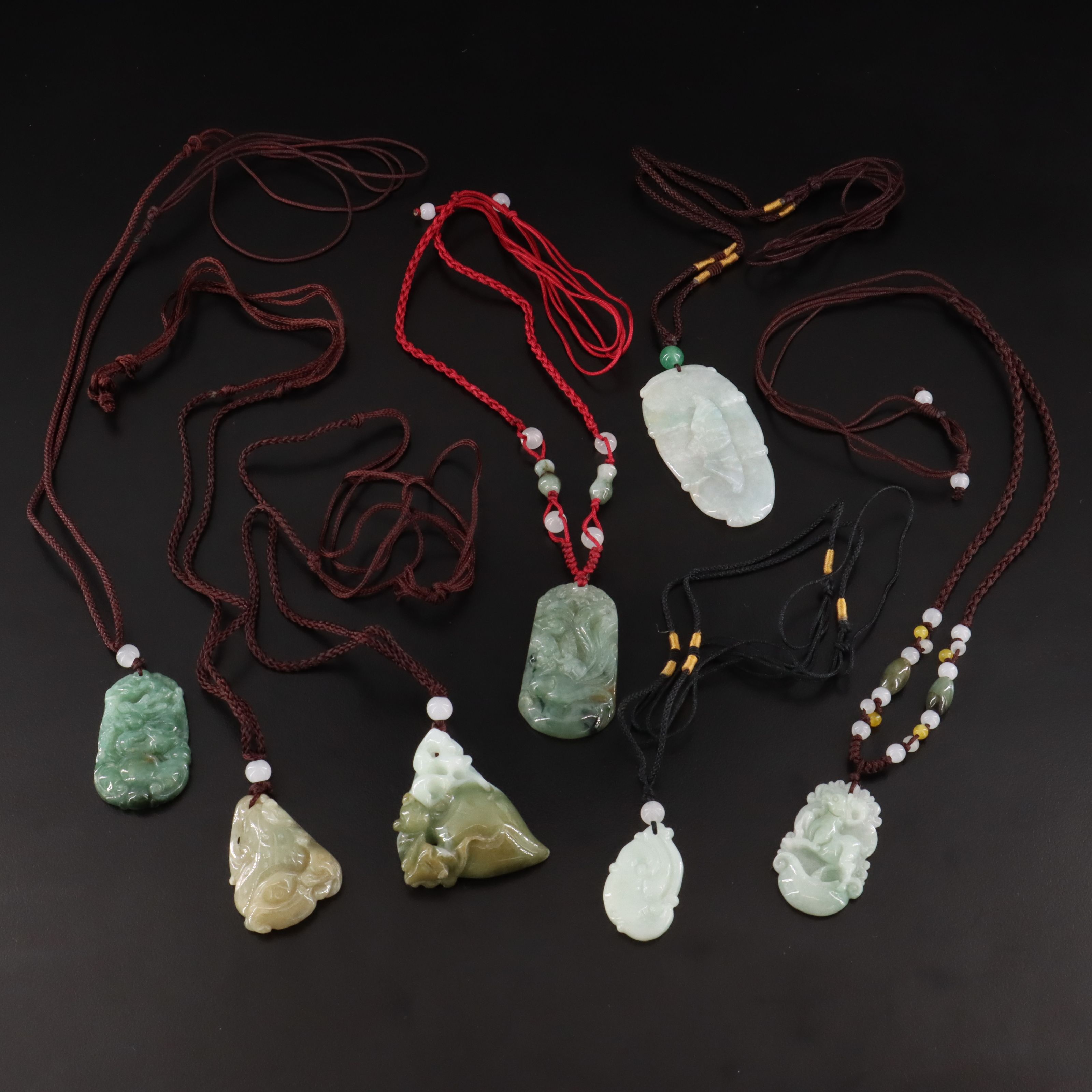 Carved Jadeite Necklaces with Glass Accent Beads