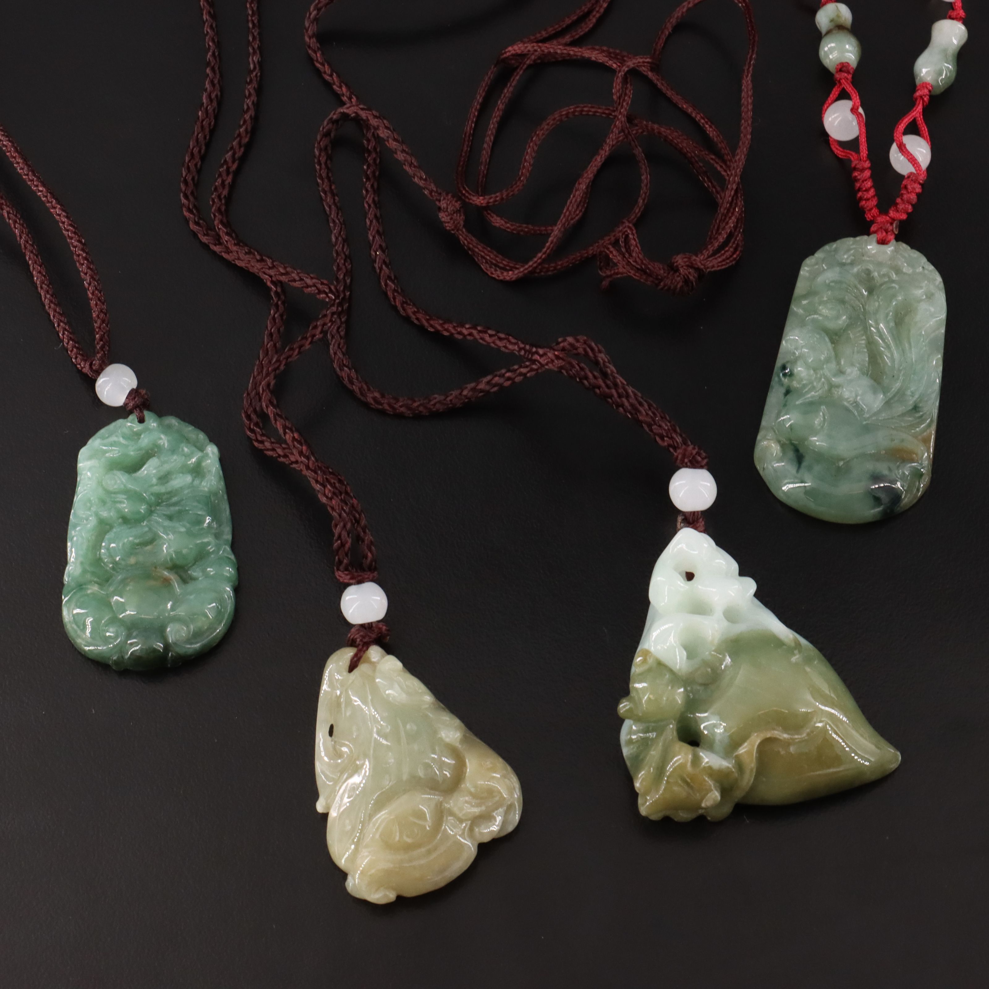 Carved Jadeite Necklaces with Glass Accent Beads