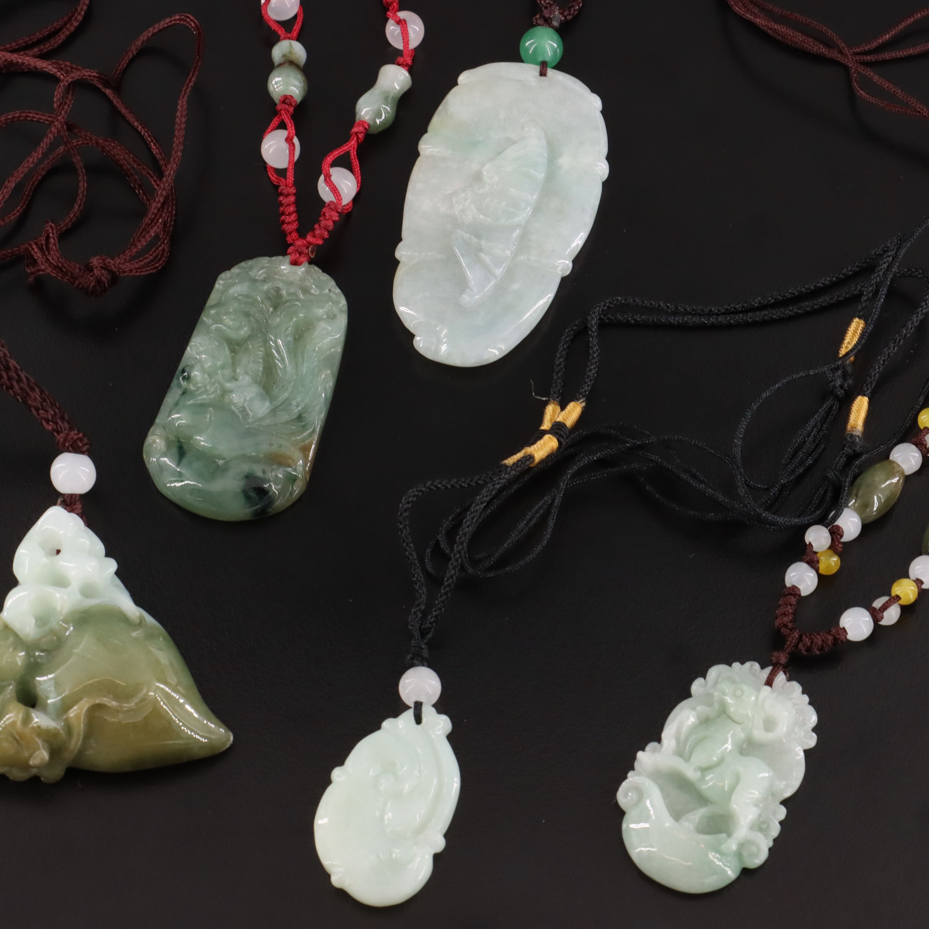 Carved Jadeite Necklaces with Glass Accent Beads