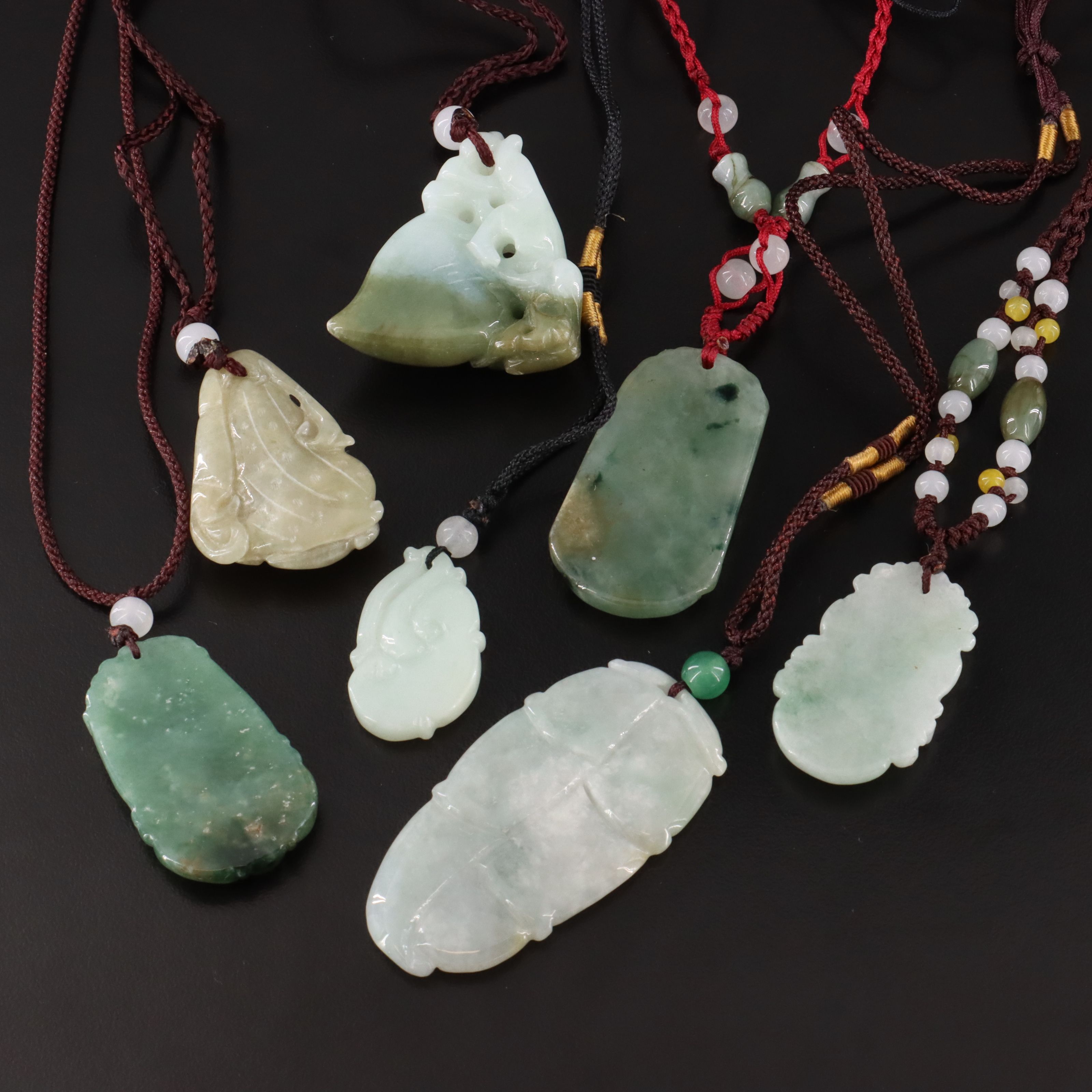 Carved Jadeite Necklaces with Glass Accent Beads
