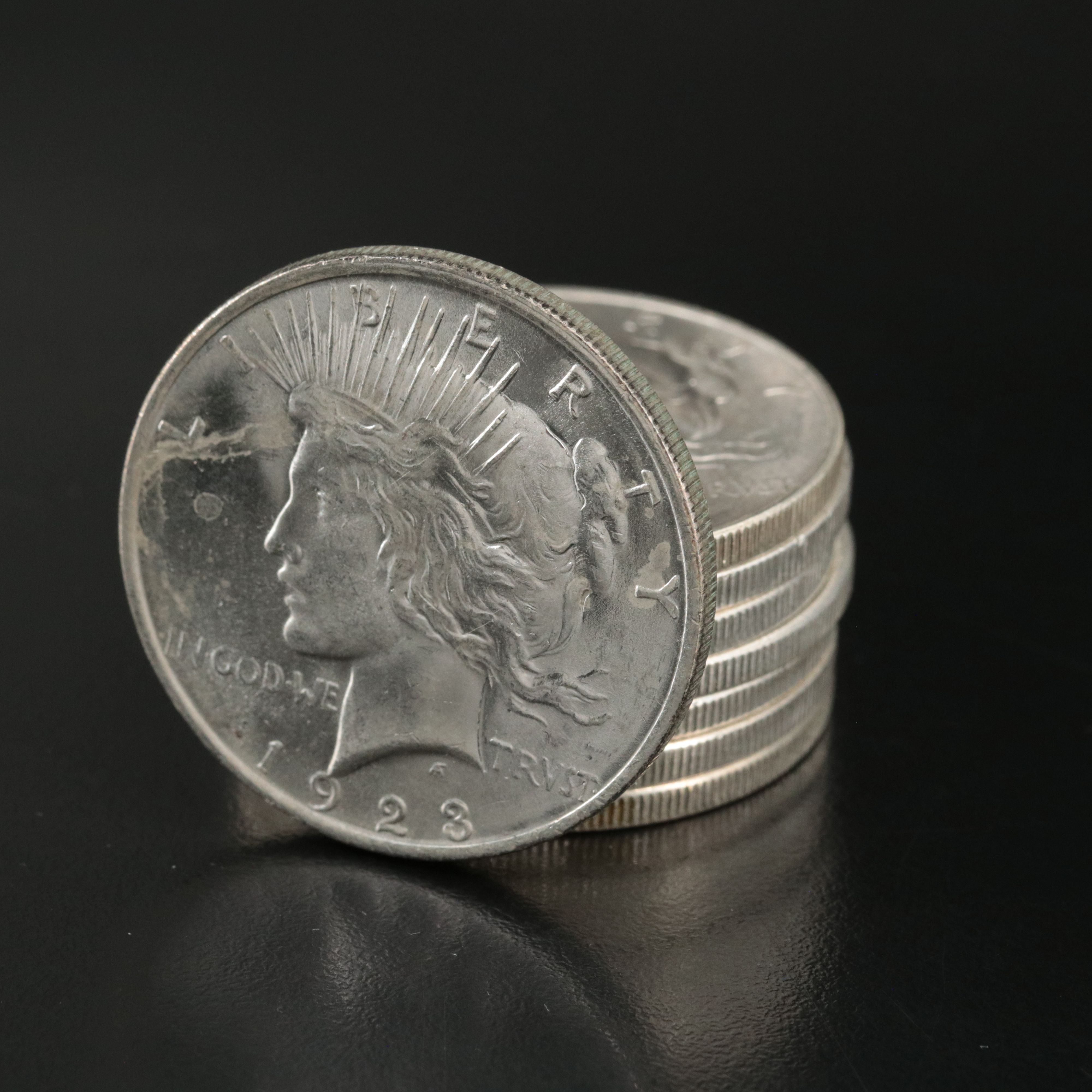 Eight 1922 and 1923 U.S. Peace Dollars