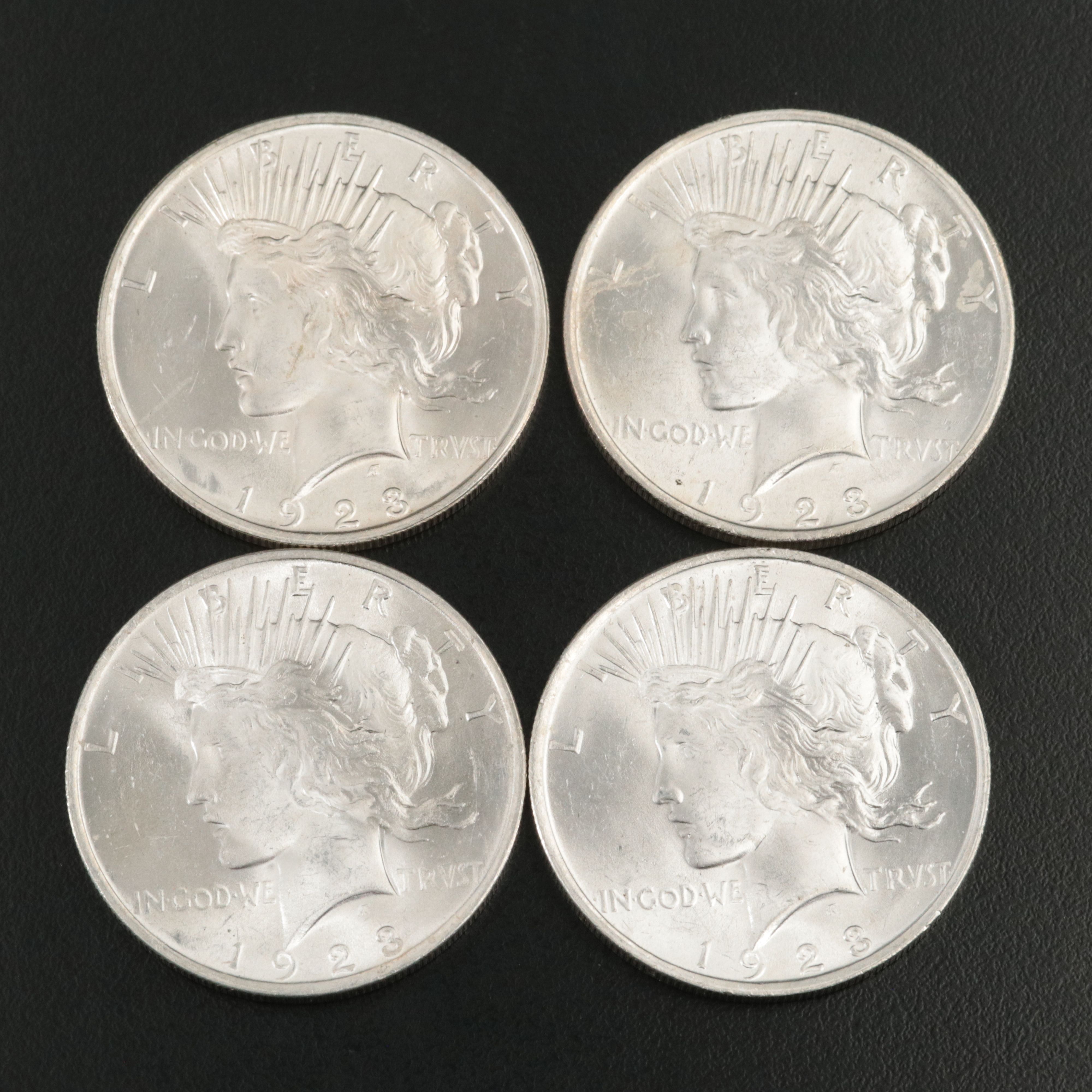 Eight 1922 and 1923 U.S. Peace Dollars